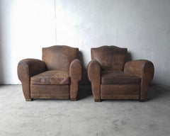 Sillones de cuero patinado de estilo francés de Restoration Hardware