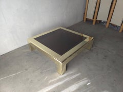 Table basse « Parson » massive en laiton et cuivre, de 5 pieds de côté, signée Karl Springer