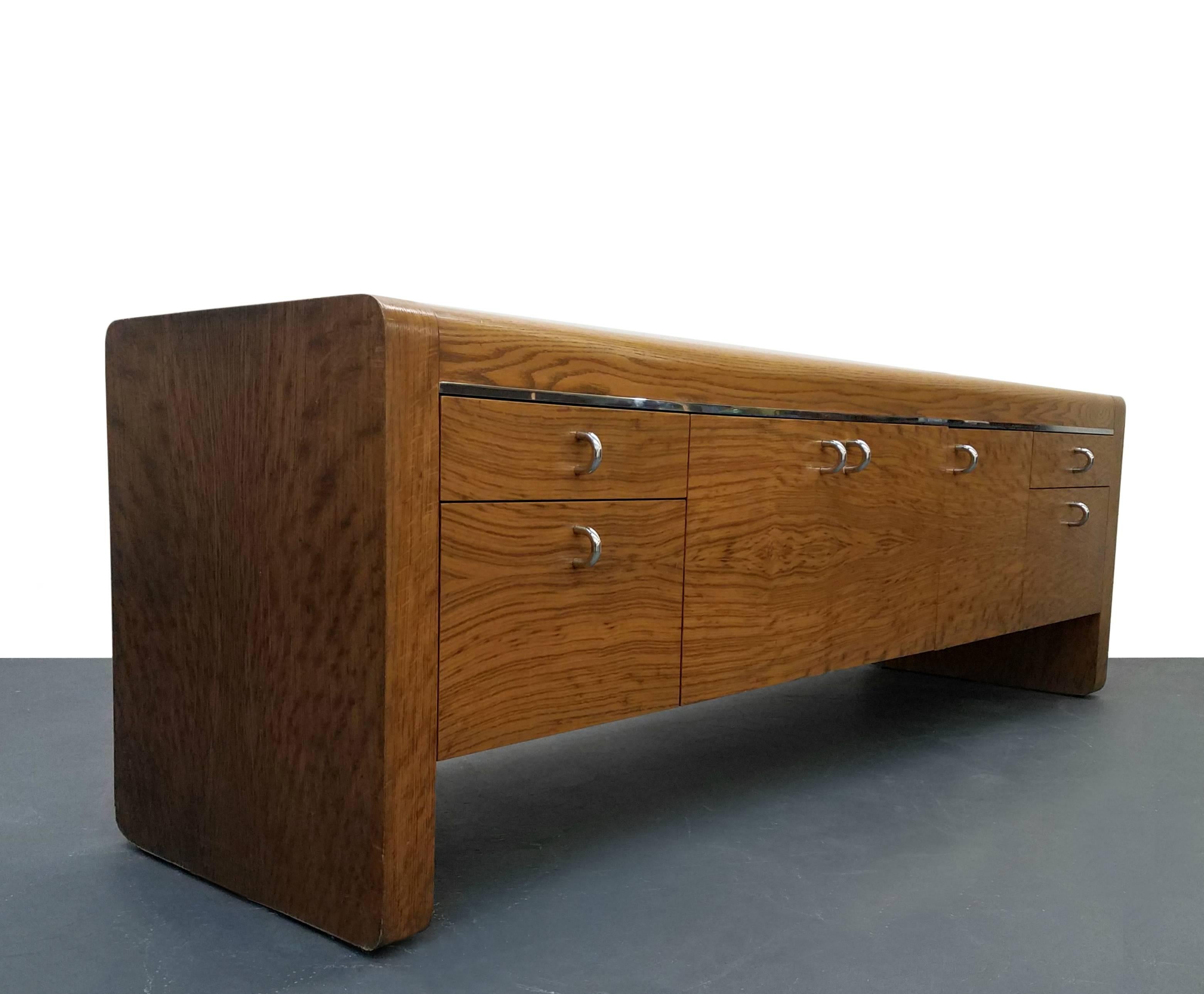 Dress it up or down, this massive 90" credenza would look amazing in a modern office or an urban loft. At over 7 feet this piece can accommodate quite the gamut of large art pieces and decor.

Constructed out of beautifully grained tiger oak