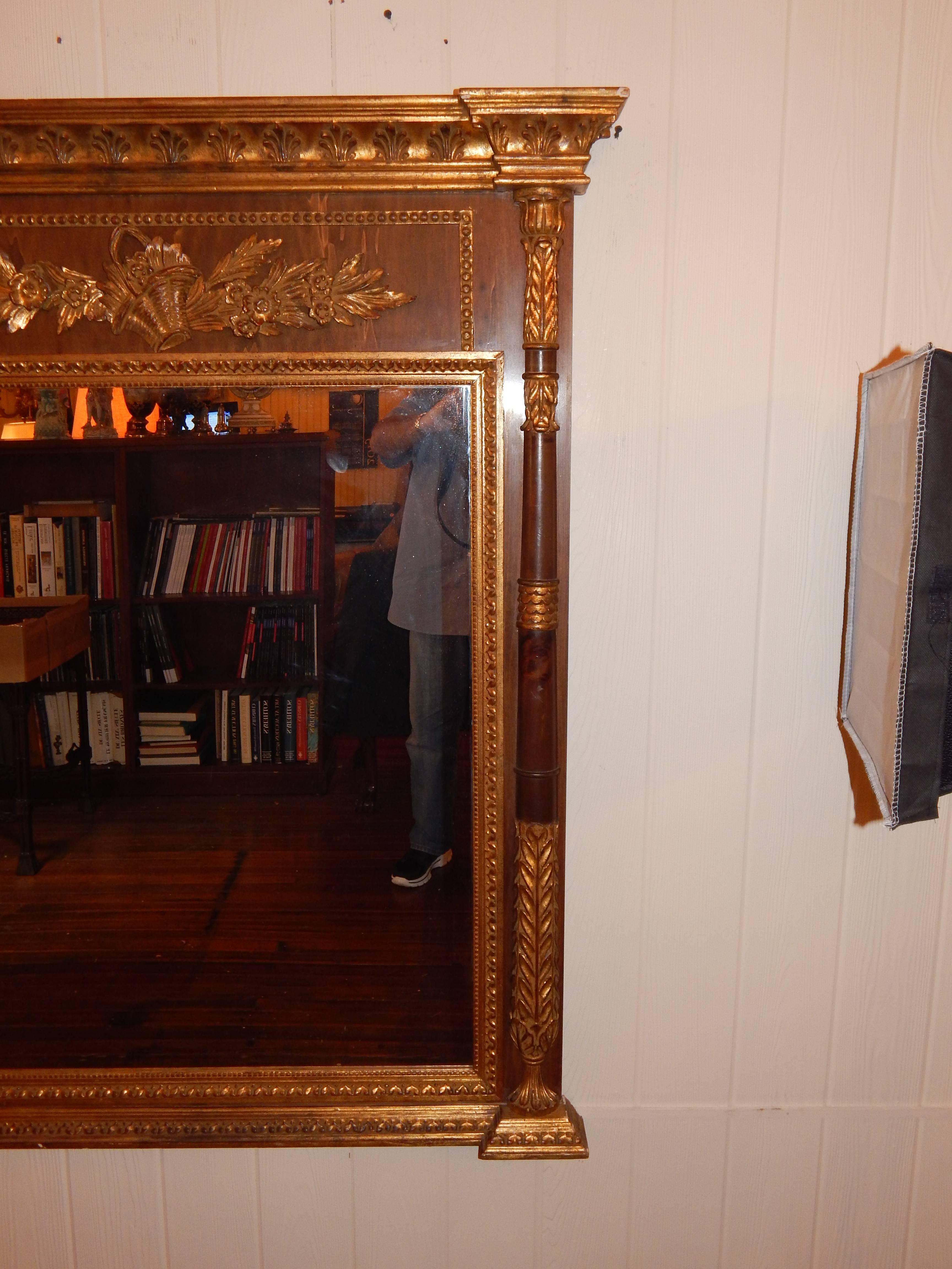 Carved Neoclassic Style Parcel-Gilt Walnut Mirror For Sale