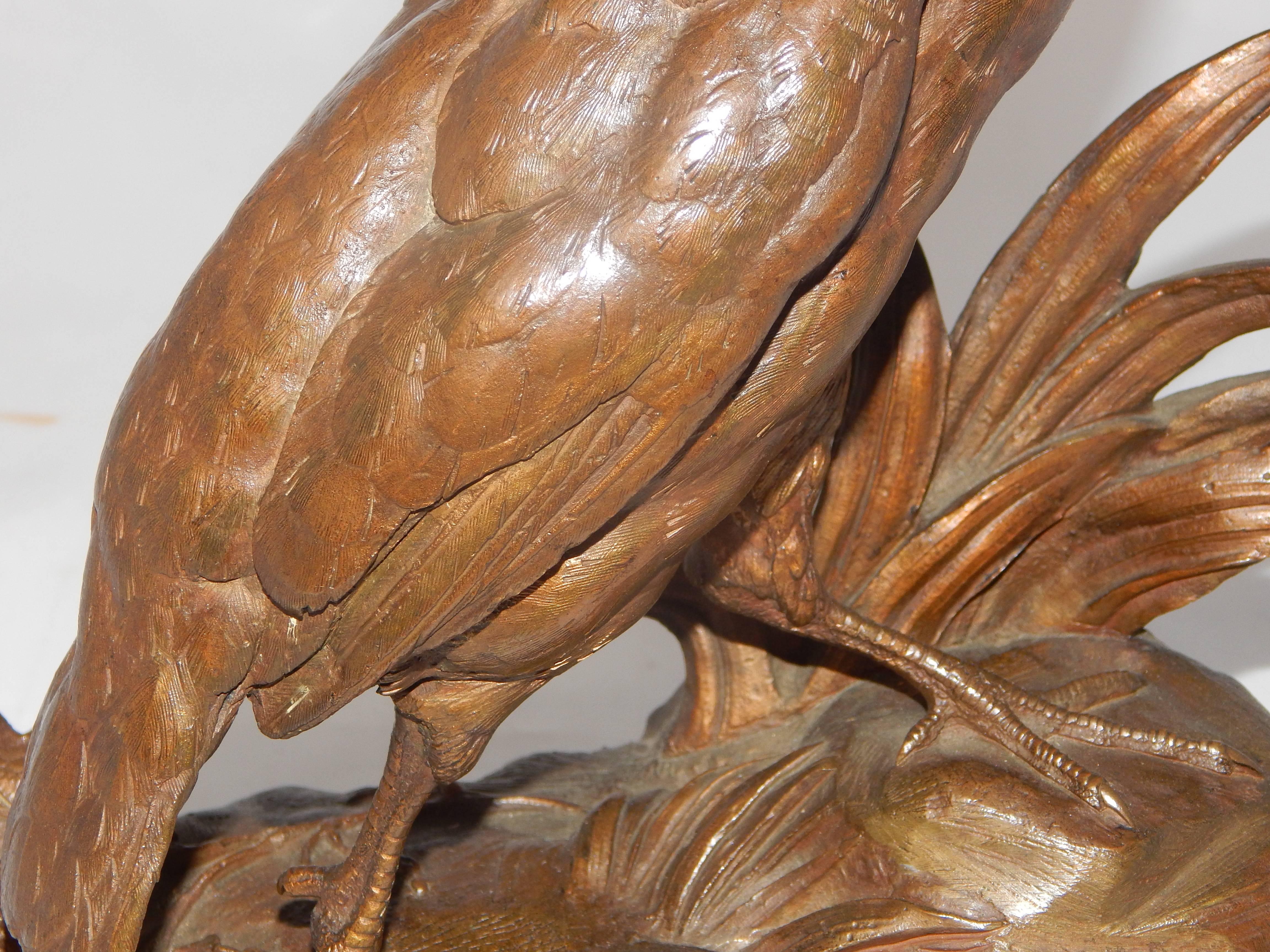 A nice golden brown patina on this impressive pair of bronze sculptures of Pheasants by Jules Moigniez.
These were used separately for a while, and for some reason, there are traces of greenish paint, or verdigris on one of them. (last 4