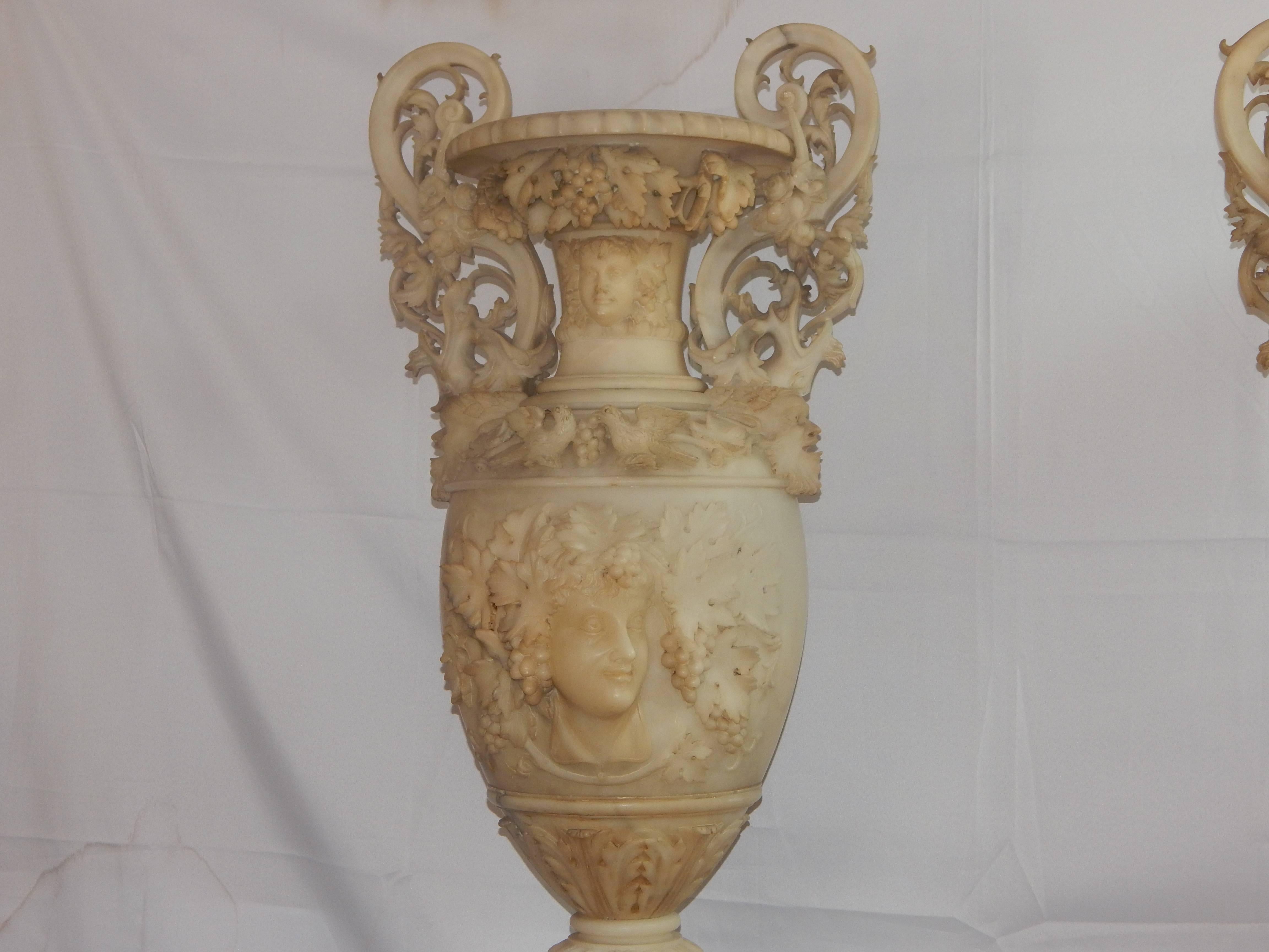 Baroque Revival Monumental Pair of Carved Alabaster Urns and Pedestals