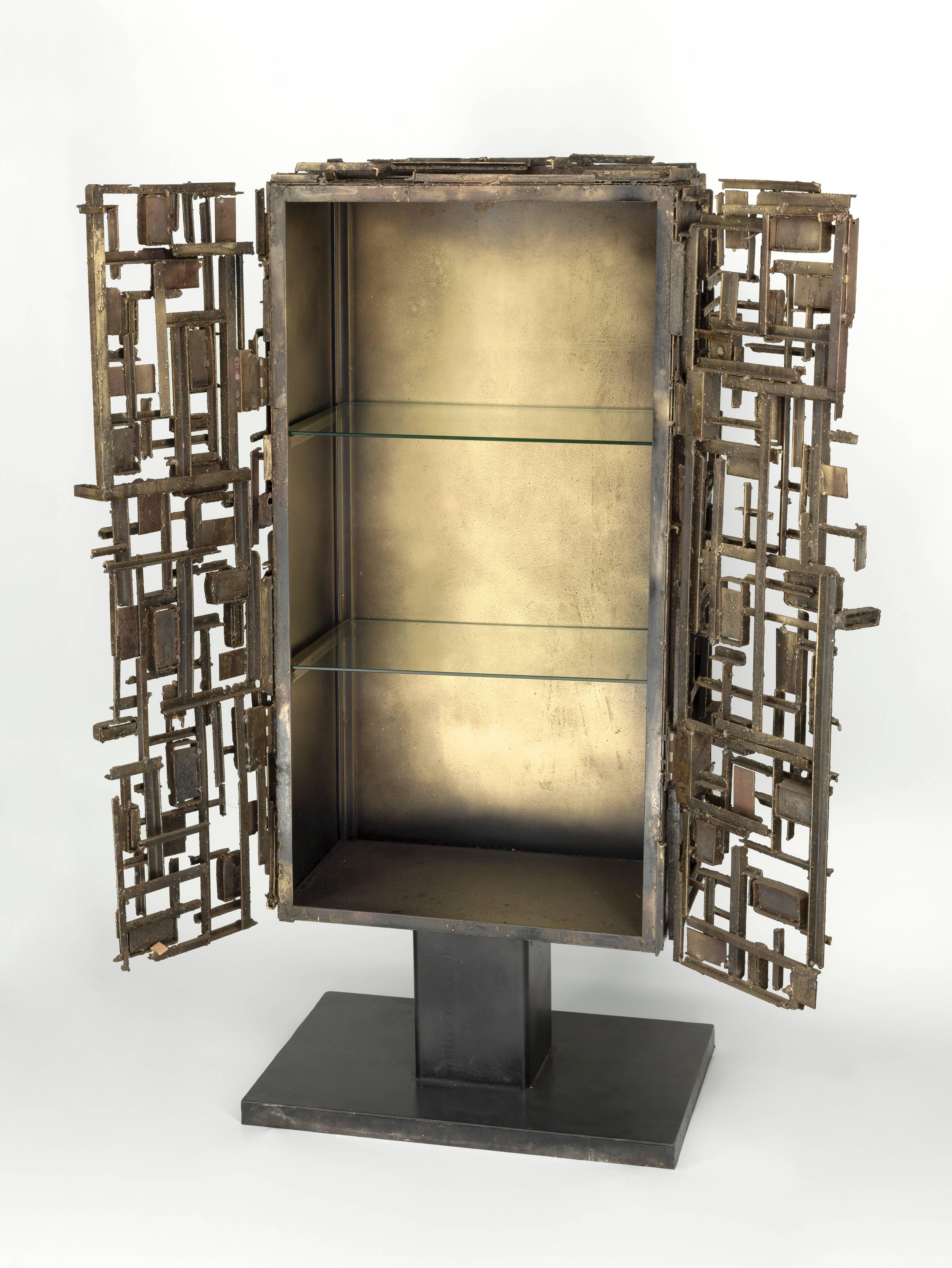 Labyrinthe, from the Cathedral series. One of a kind hand made sculptural cabinet by James Anthony Bearden. In the Brutalist style, this decorative piece adds a unique touch to your modern interior. Made from blackened and textured steel, fused