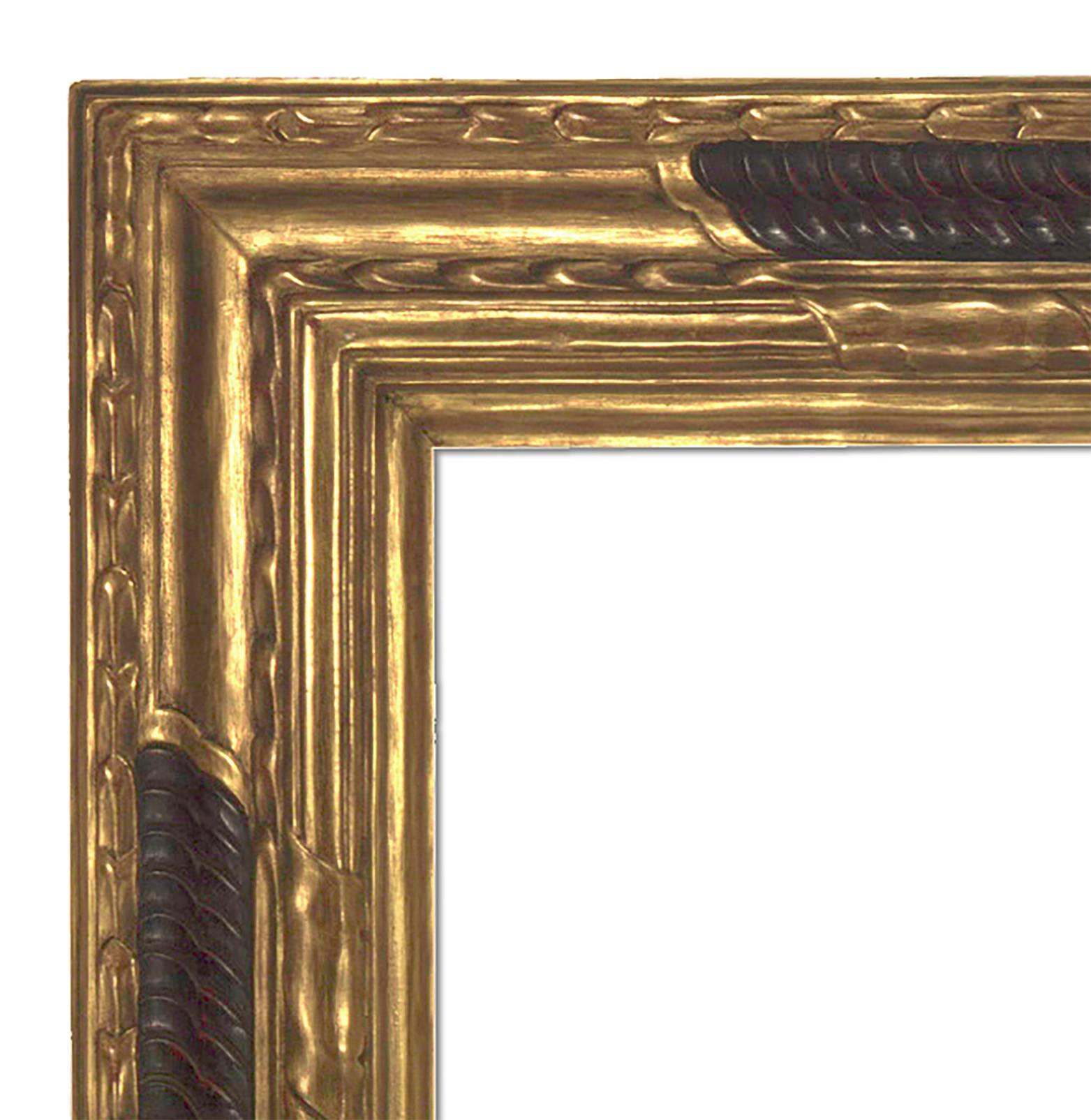Early 20th century Arts & Crafts style carved and gilt framed mirror 28