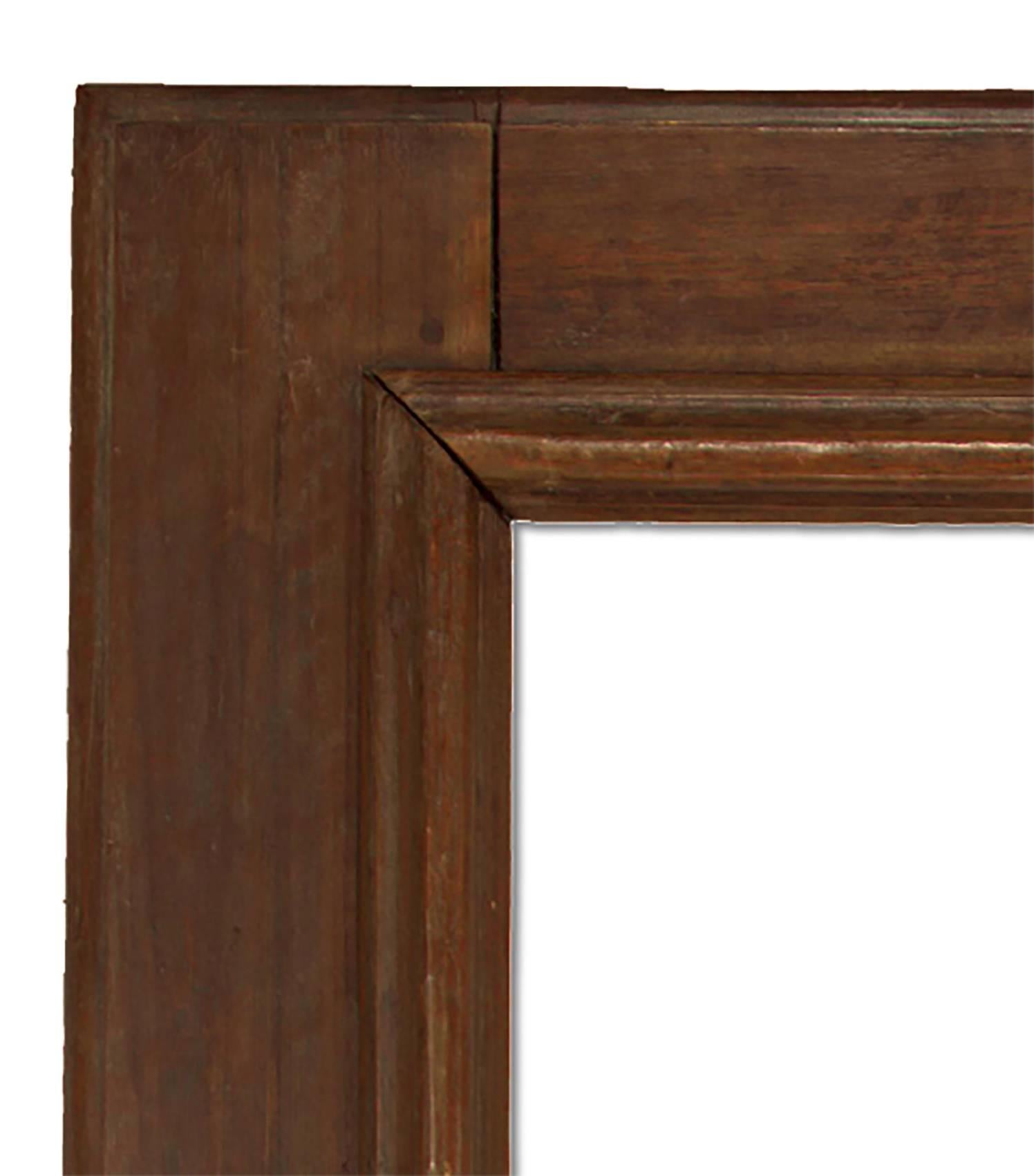 Hand-carved walnut mirror in the 18th Century Italian style. 29