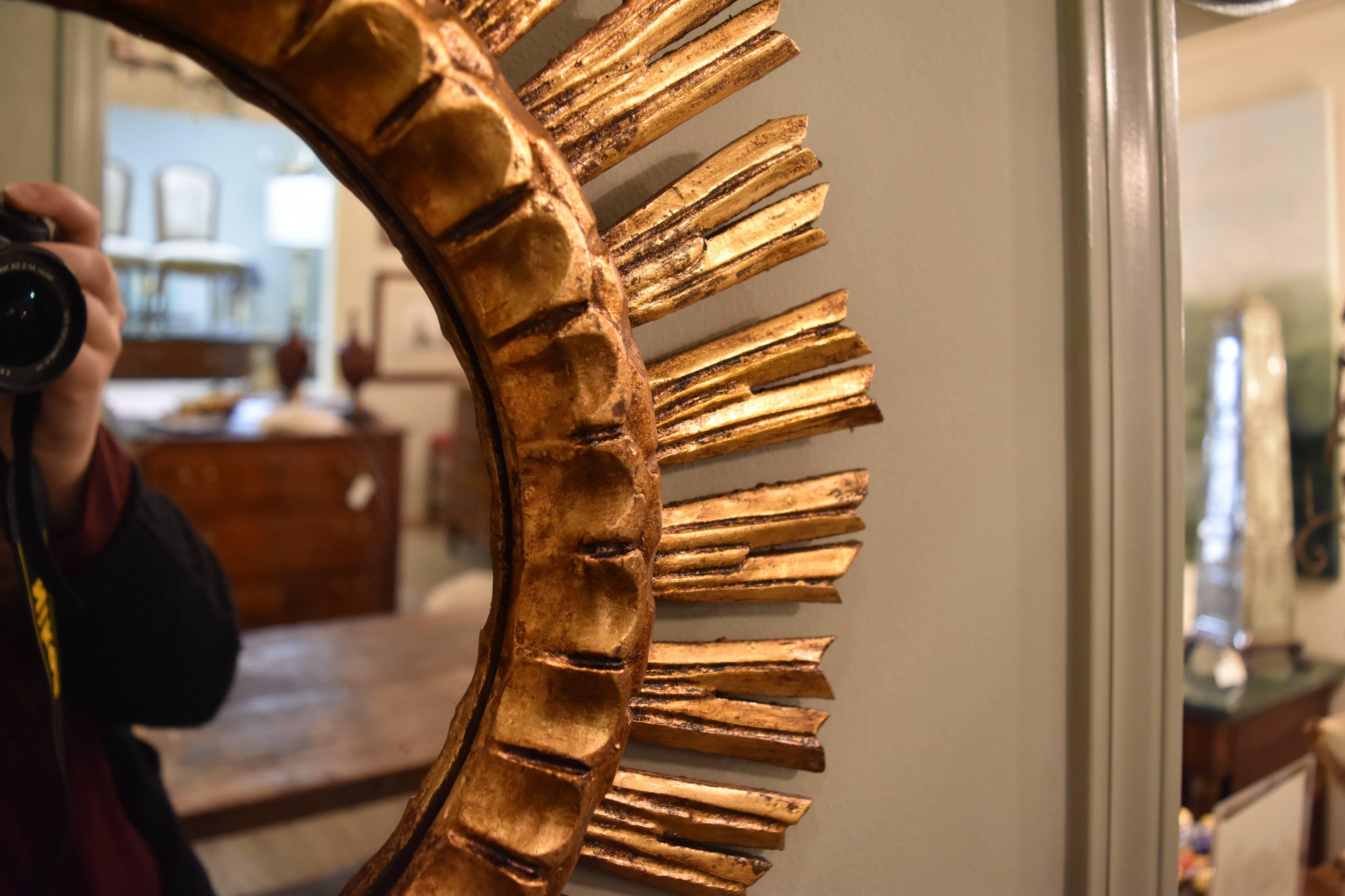 This pair of early 20th Century Giltwood Sunburst Mirrors is in excellent condition with a handsome gold leaf finish.