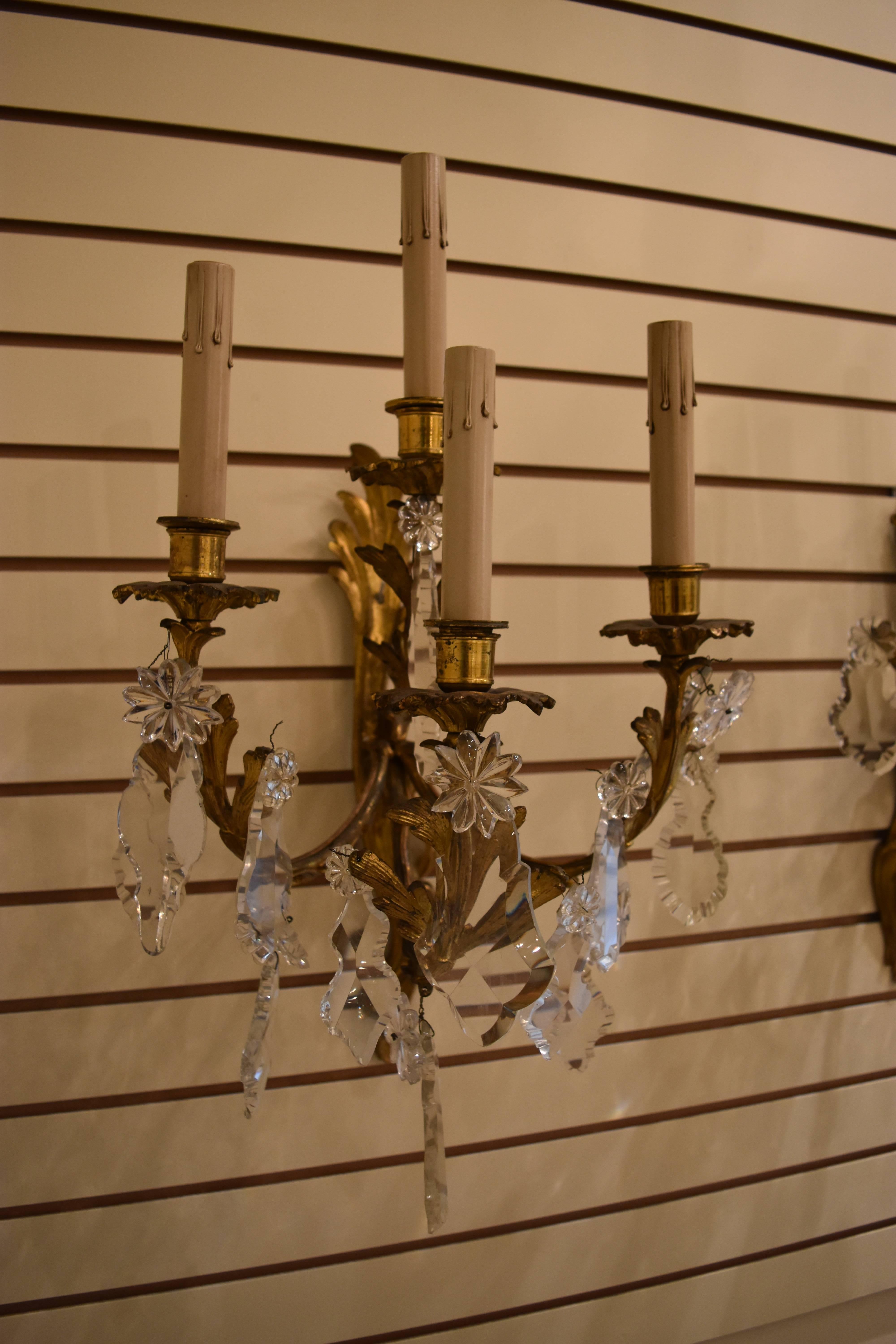 Louis XV Pair of French Bronze and Crystal Sconces