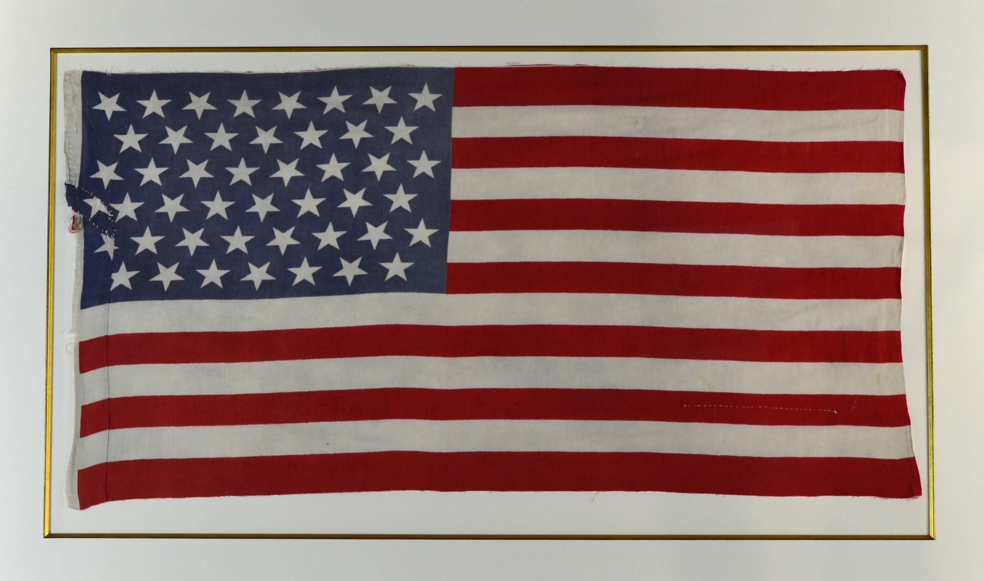 Authentic antique 45 star flag from 1896. The 45 star flag was made famous as it was used during the Spanish American War with Teddy Roosevelt and the Rough Riders.

This 45 star flag is made of printed cotton as was the normal manufacture at this