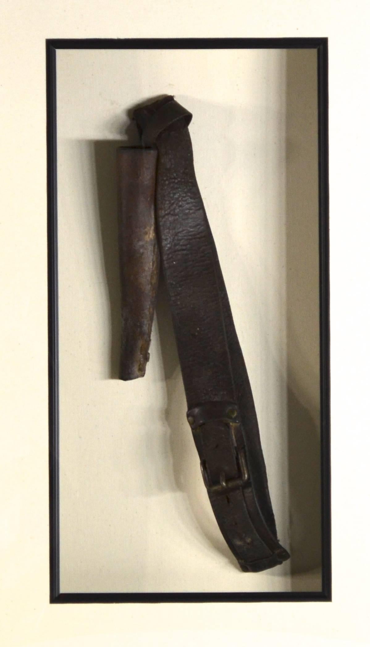 A rare Civil War flag bearers belt and flag staff holder. It is hand made of leather with hand stitching on the staff holster. Original belt buckle. In as found condition with museum framing and UV acrylic. I have had this in my personal collection