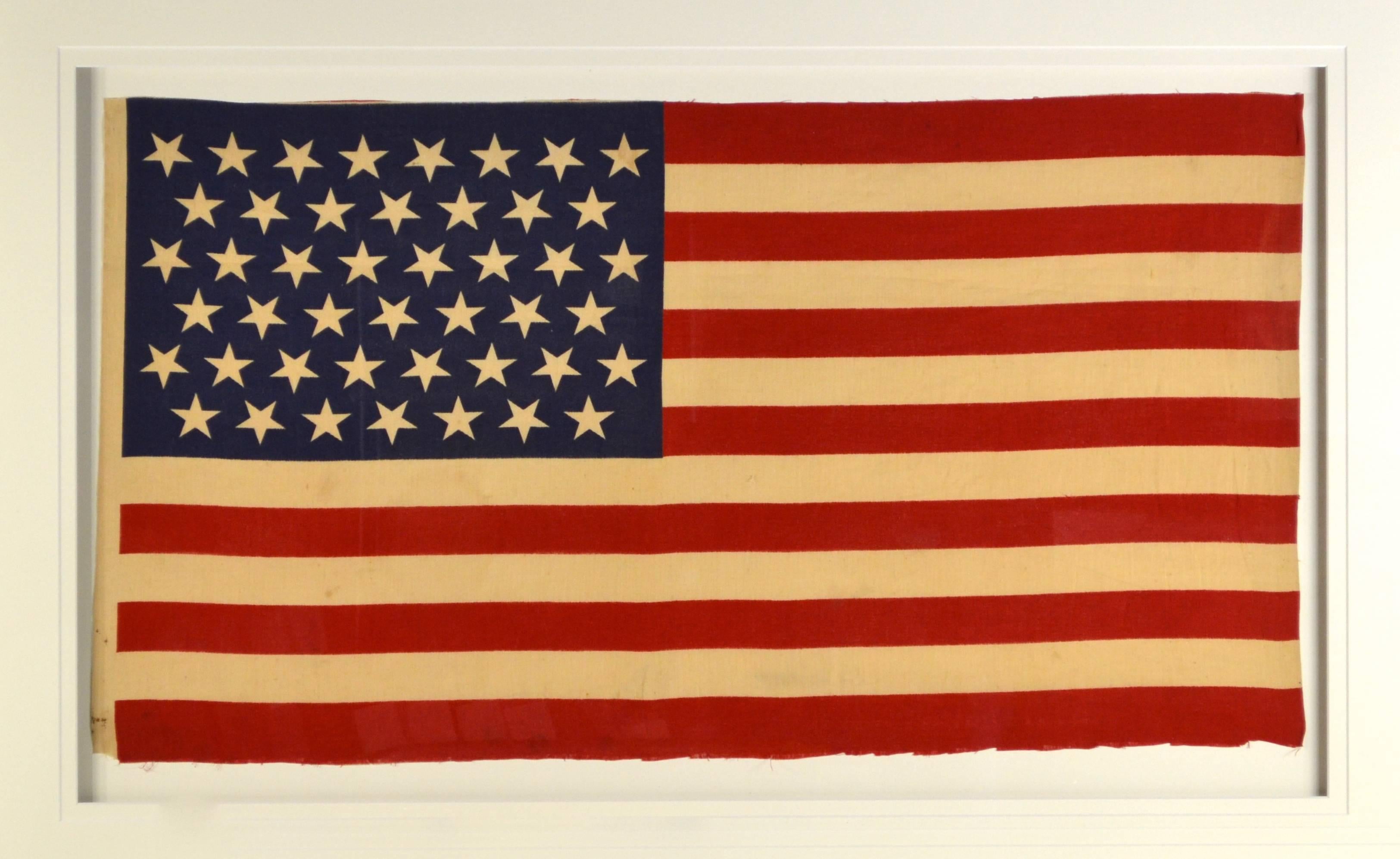 Beautiful 45 star flag, circa 1896. The 45 star is most popular due to its connection to Teddy Roosevelt and The Rough Riders during The Spanish American War. The flag is made press printed cotton in a textile mill where all types of patterns and