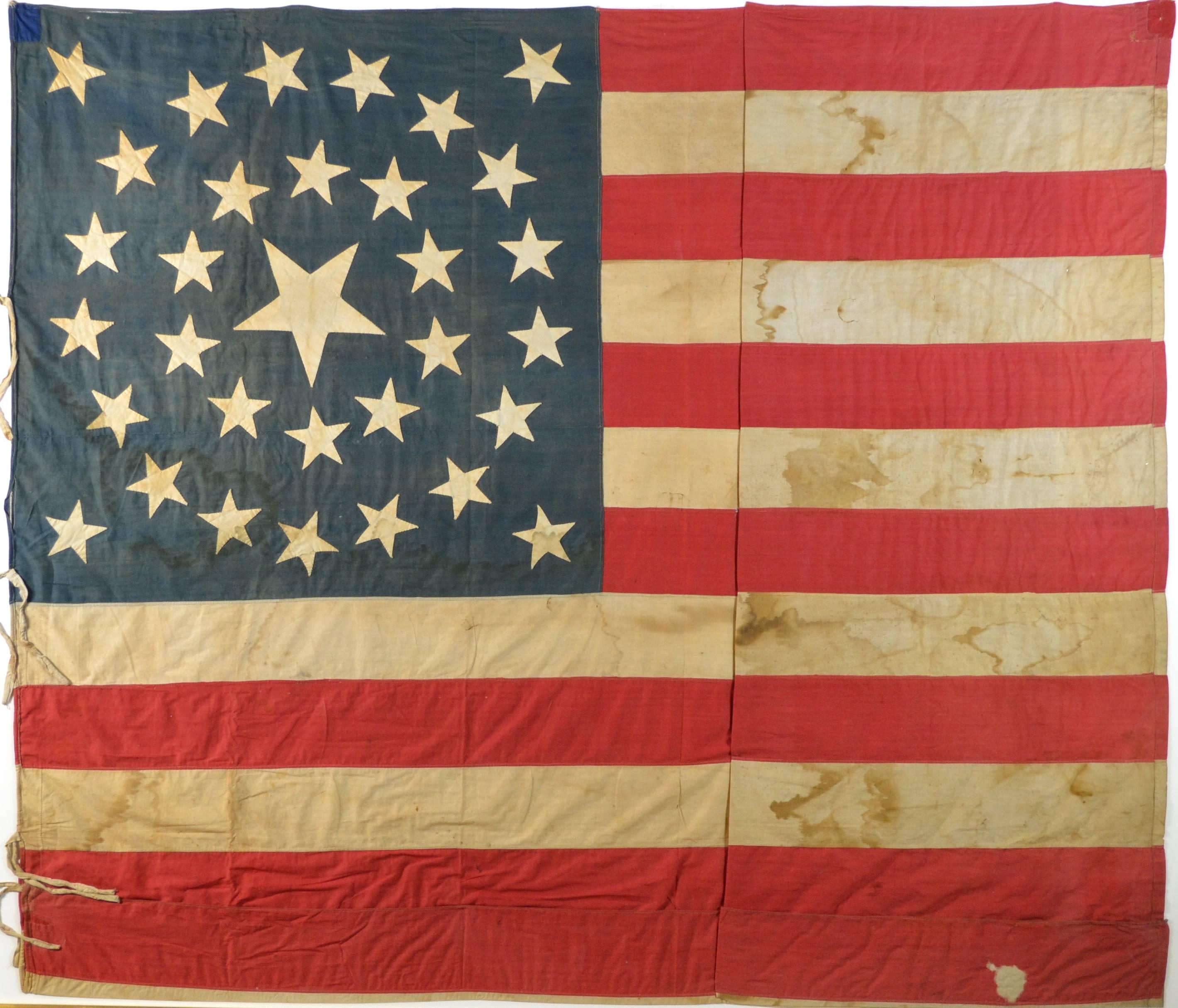 Antique 32 star flag

Extremely rare 32 star flag from 1858. The flag is hand-sewn and the stars are arranged in a pattern called a medallion. The larger center star is the star signifying the new state that has just entered the “union”

This is