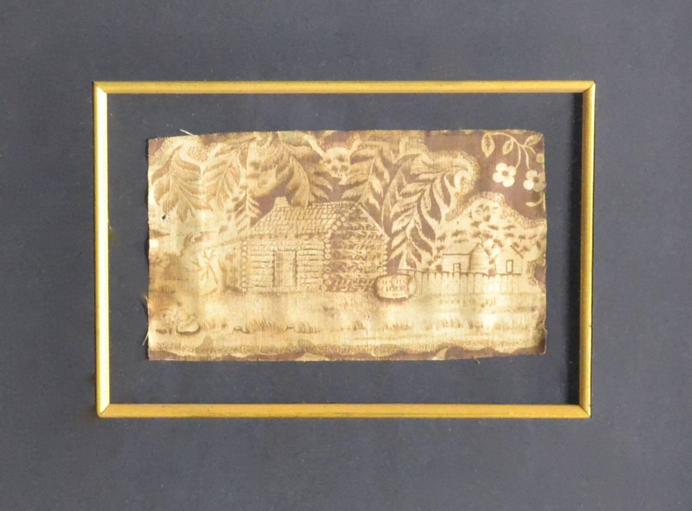 Remnant from an original antique Presidential Campaign textile for President Andrew Jackson. It features a log cabin which was one of his Campaign slogans. He was our 7th President circa 1820.
Size approximately 4"x6" frame 21" x