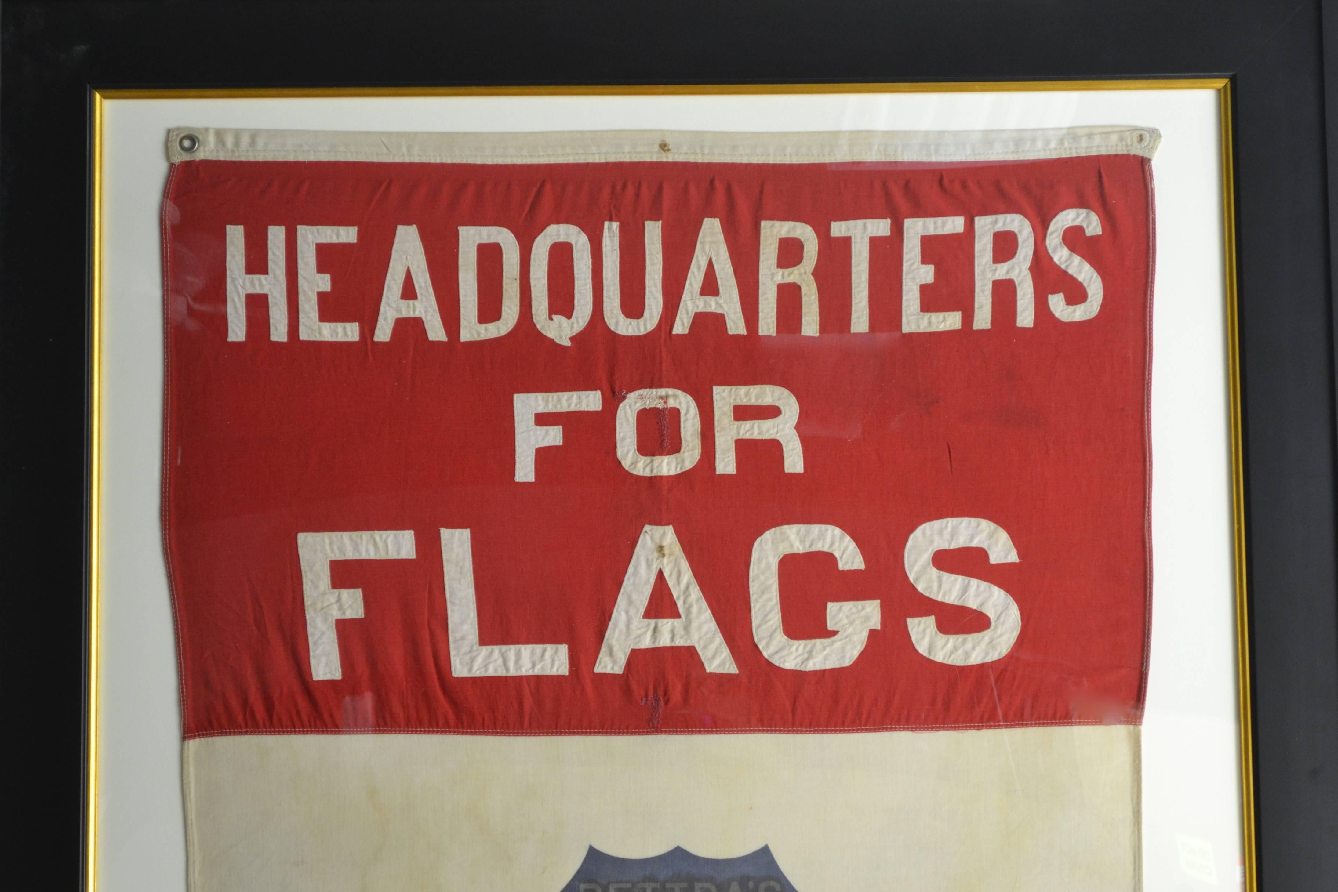 What a incredible rare find....A large vintage advertising banner for a flag manufacturer. It is large 72