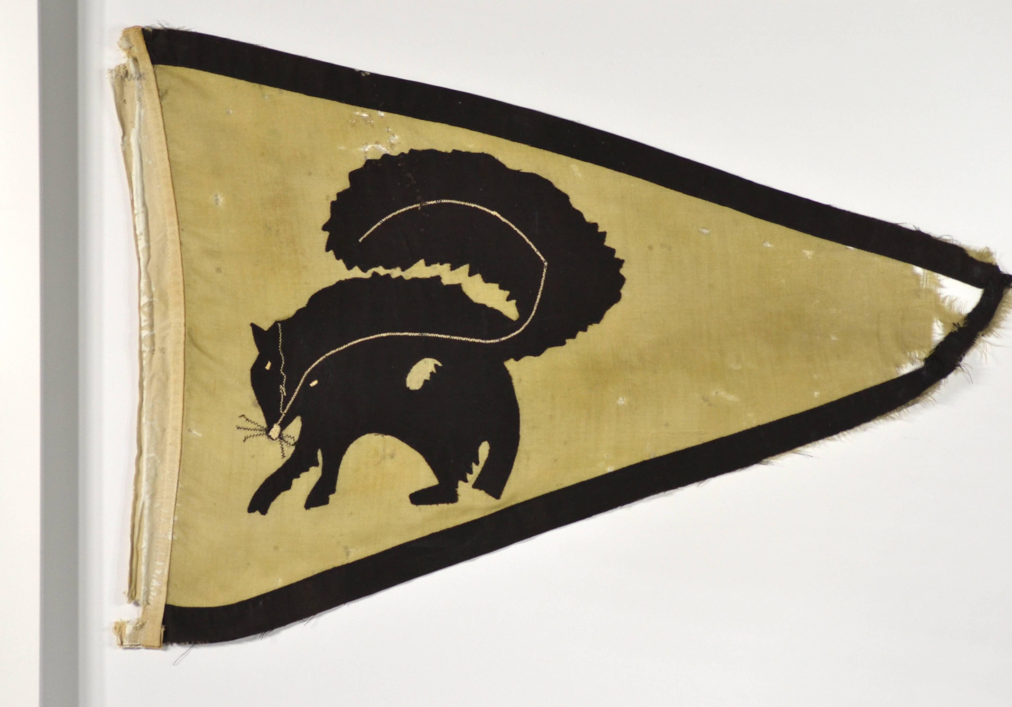 Rare antique hand-sewn fishing tournament flag picturing a skunk. This flag would have been flown at the top of the boats mast as they came into port signifying they were 