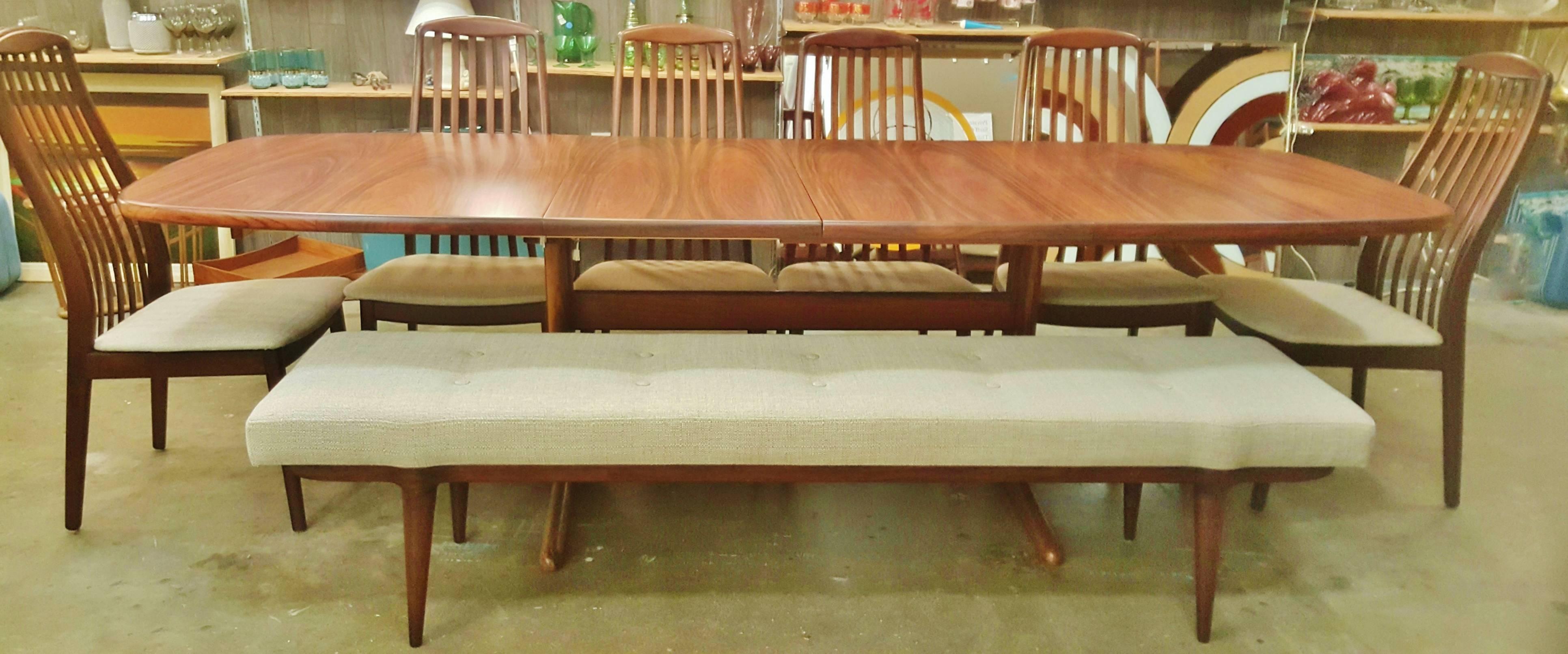 This totally hot Danish Modern rosewood bench is super rare and super styling! Featuring tapering conical legs that curve around the front of the legs (as does the seat) with a gorgeous rich tone that compliments the tweed upholstery perfectly.