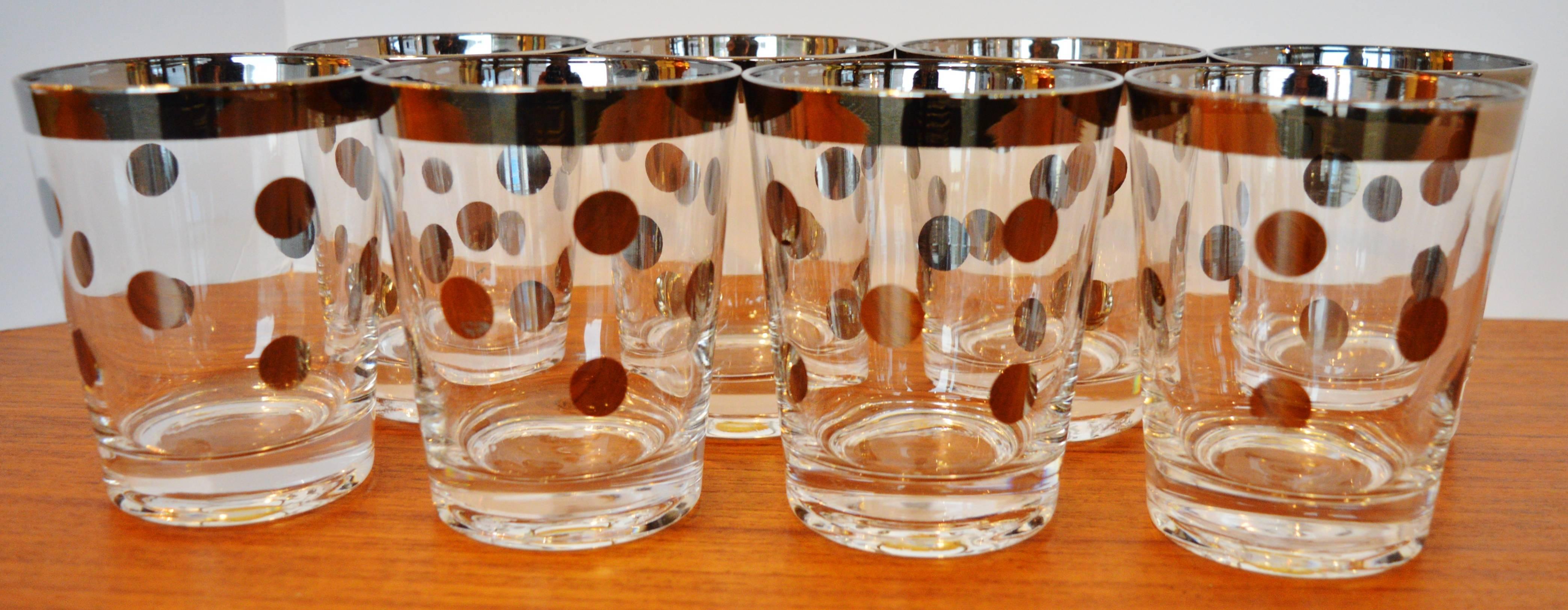 This awesome set of eight virtually unused Dorothy Thorpe silvered edge glasses with playful polka dot design would make an excellent addition to any bar set or serving set. In phenomenal condition with no chips or cracks and very little wear to the