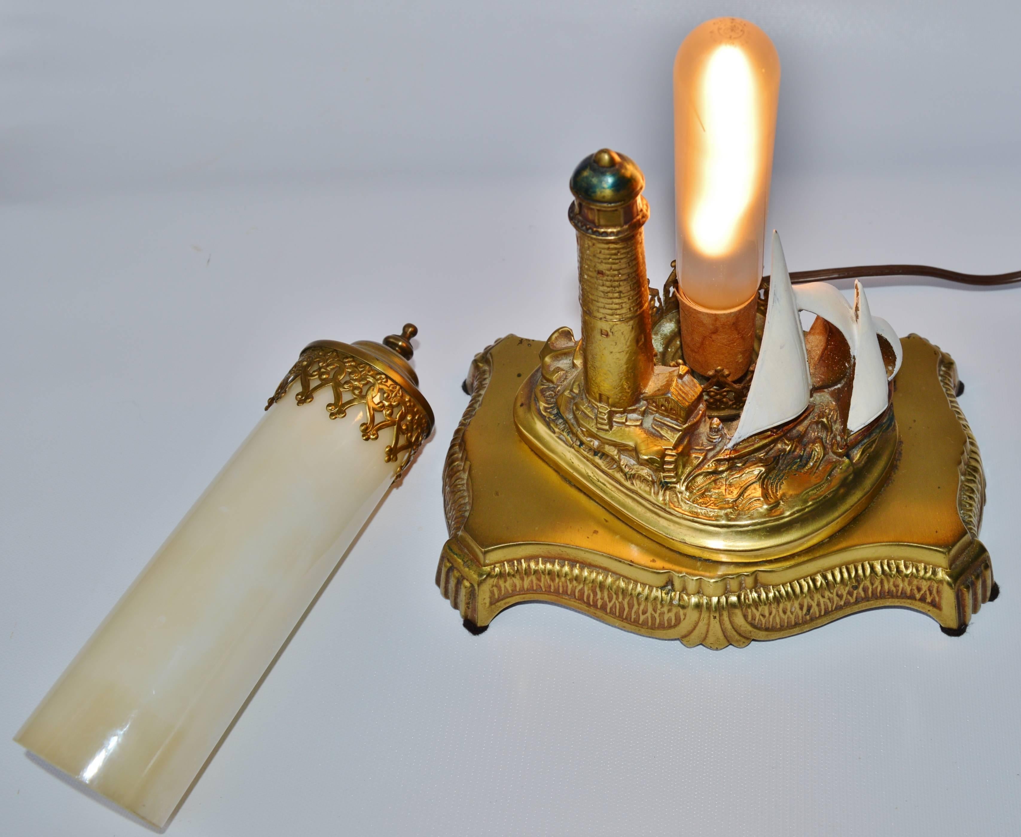 Mid-20th Century Antique Brass Lighthouse Lamp with Opalescent Glass For Sale