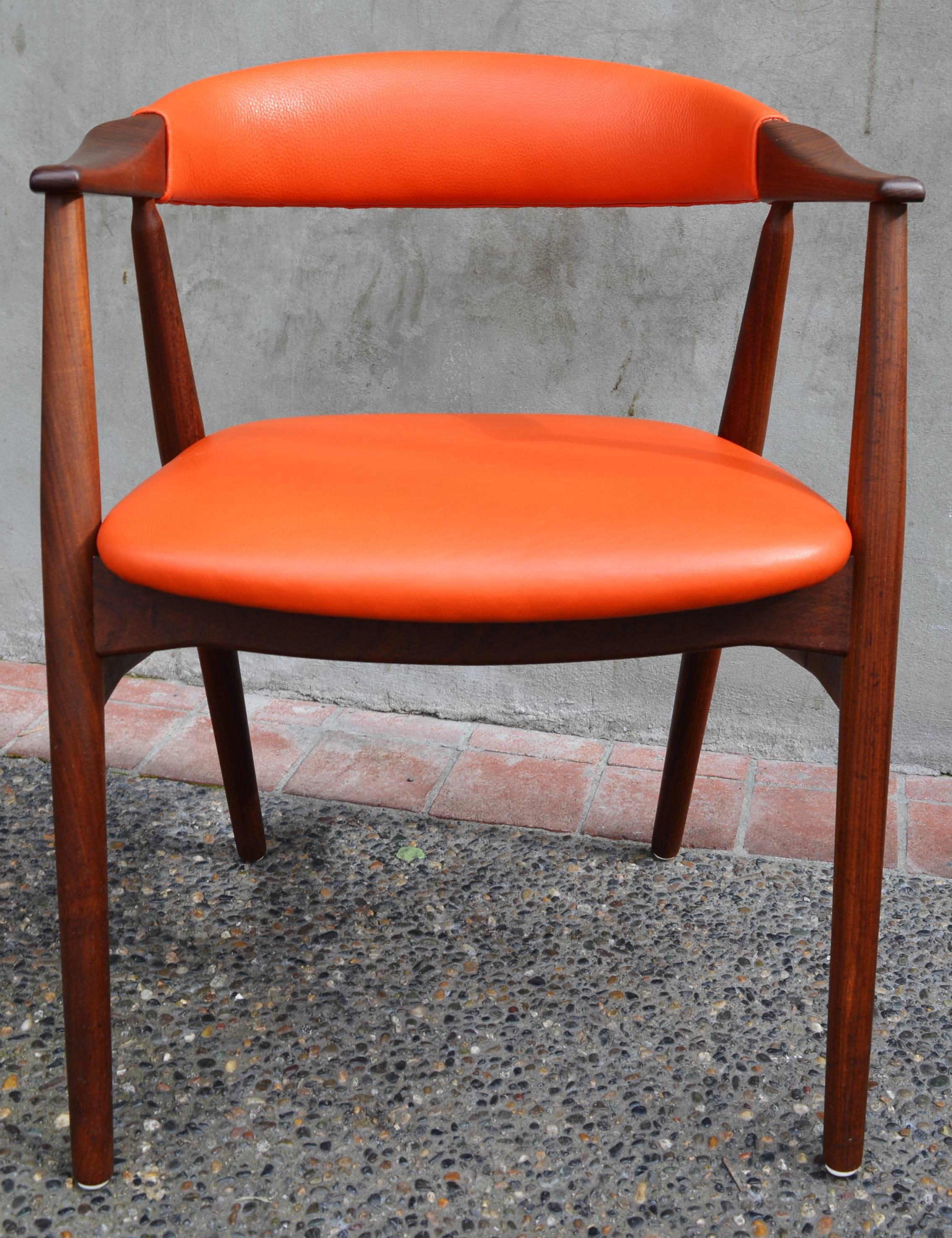 This gorgeous Danish Modern restored desk or side chair was designed by Kai Kristiansen and was reupholstered in a lovely rich orange quality leather with all new 25 year foam. Perfect as a desk chair or side chair with curves, style and beauty.