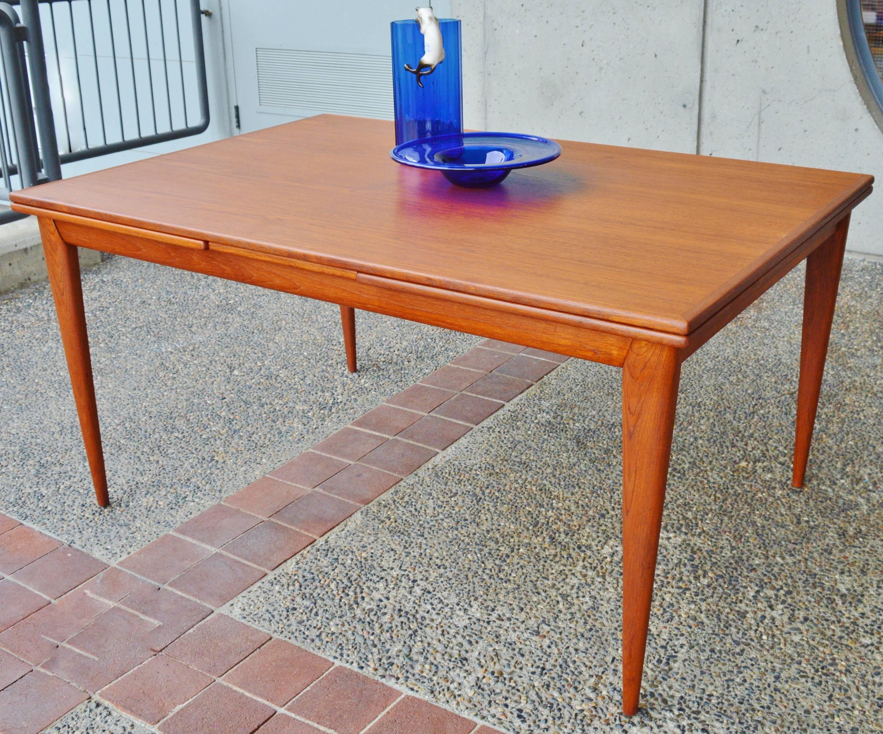 Mid-20th Century Impeccable No Moller Rare Teak Extending Dining Table with Sexy Apron and Legs