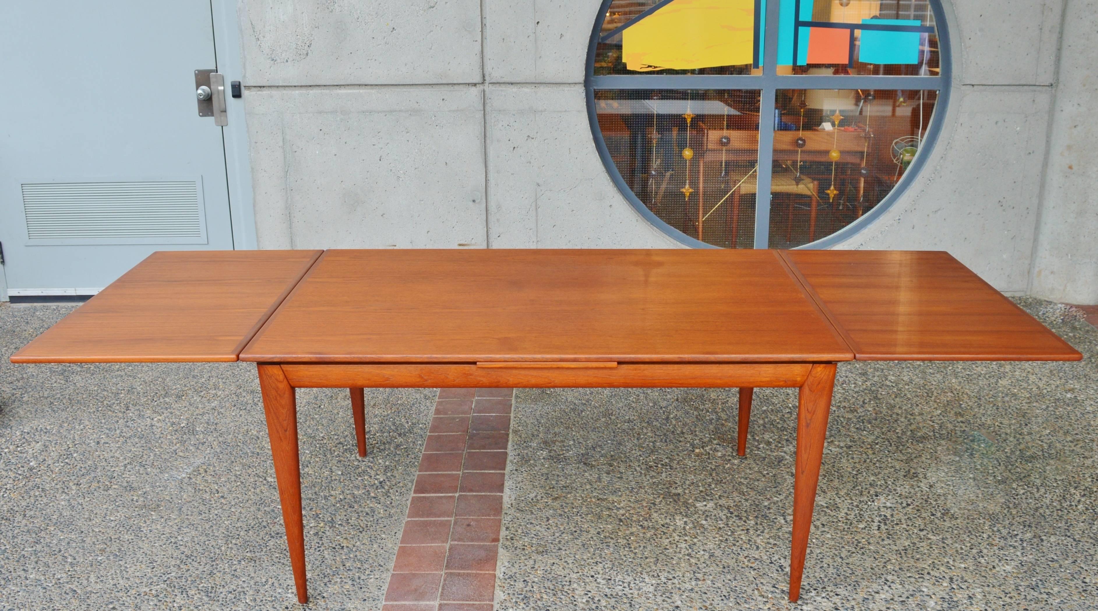 Impeccable No Moller Rare Teak Extending Dining Table with Sexy Apron and Legs 1