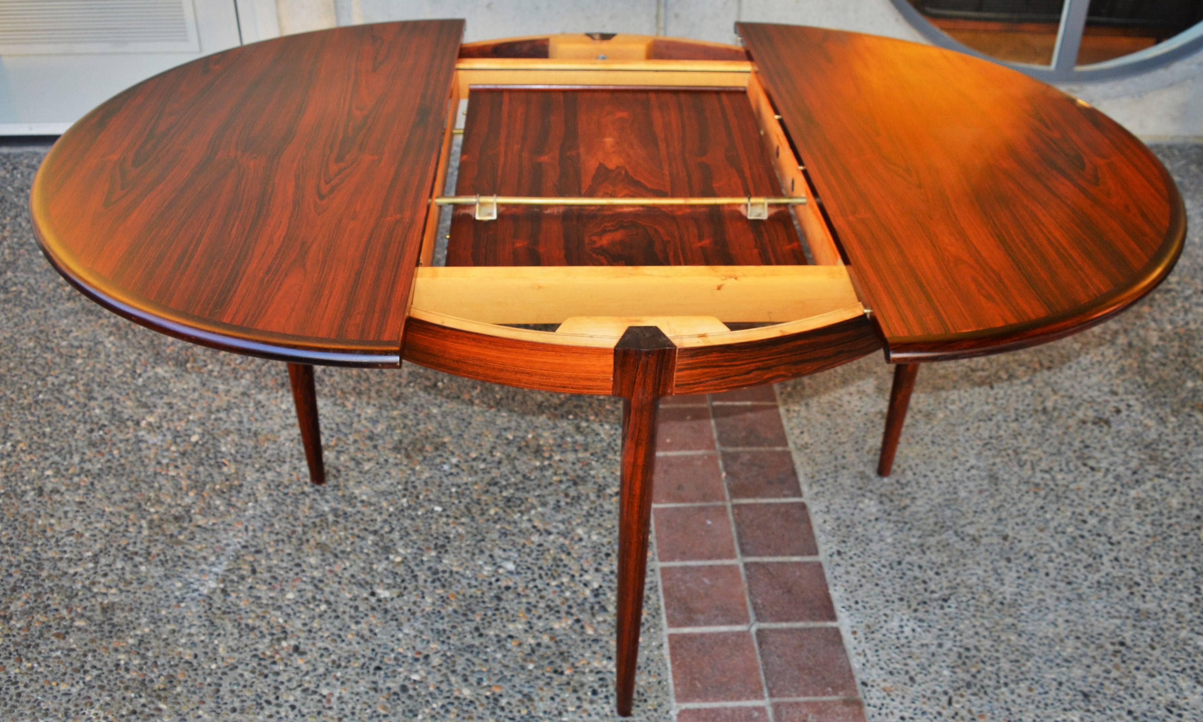 Mid-20th Century Unique Restored N.O. Moller Rosewood Round One Leaf Dining Table and Six Chairs