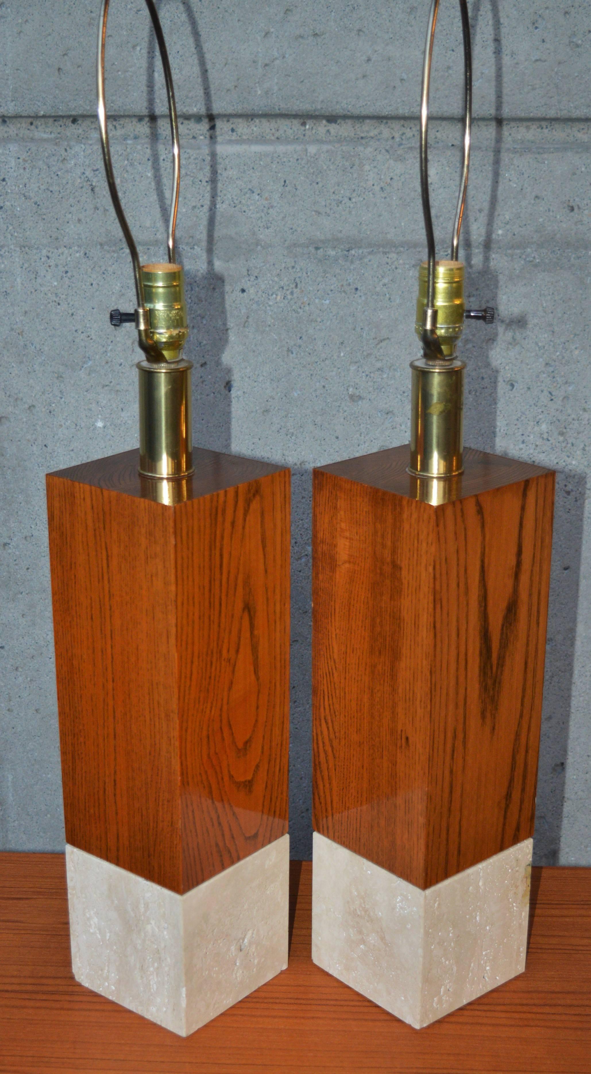 This striking pair of Italian table lamps have beautiful, clean modern lines. The cubic design has solid oak upper sections with a rich patina contrasted against the creamy marble bases. Note the slight beveled edge detail where they both meet.