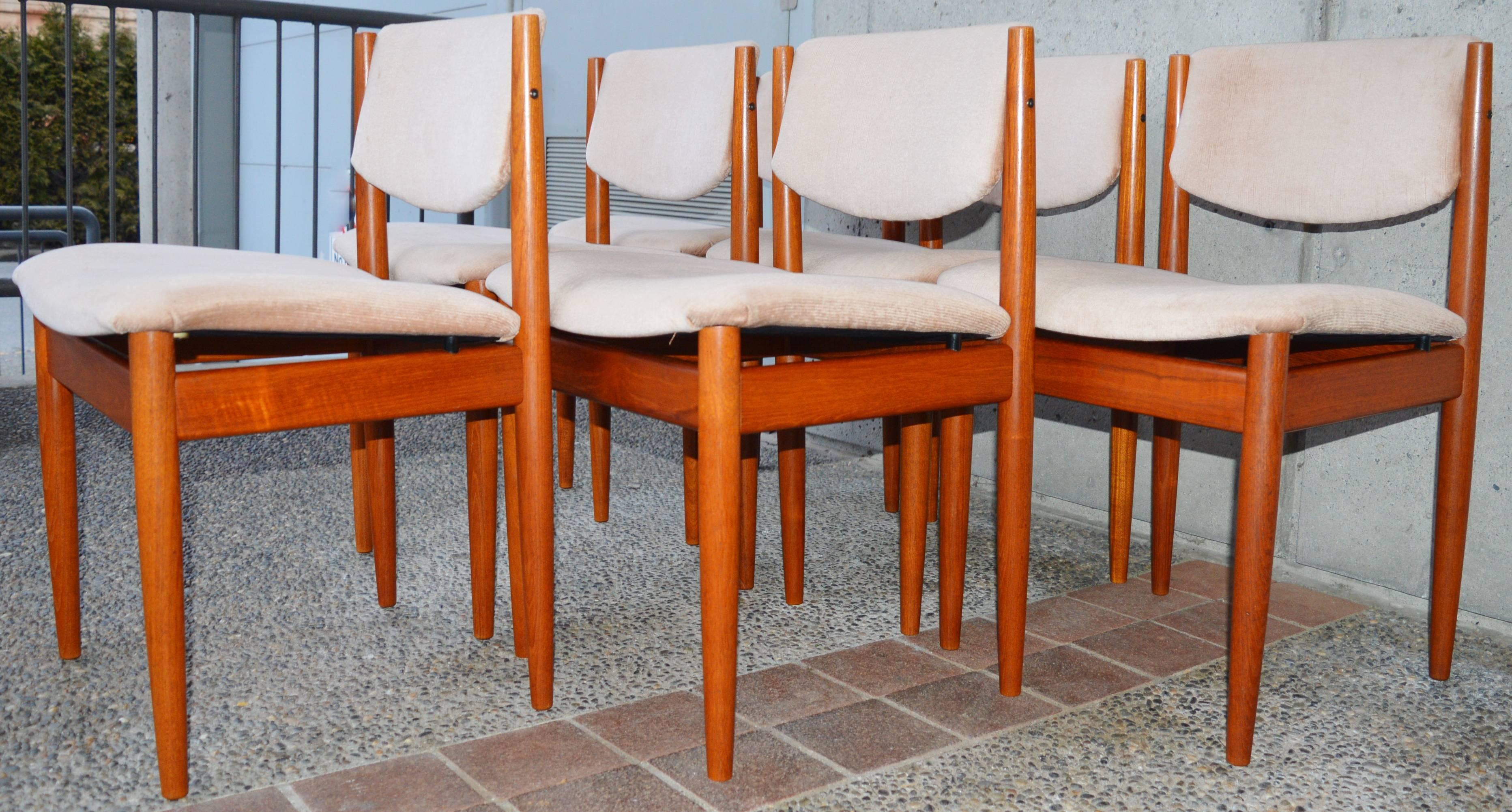 This gorgeous set of six dining chairs were designed by Finn Juhl and are one of the most comfortable dining chairs ever! The angle of the upholstered backrest is amazingly ergonomic in these model 197 chairs! The airy design features floating