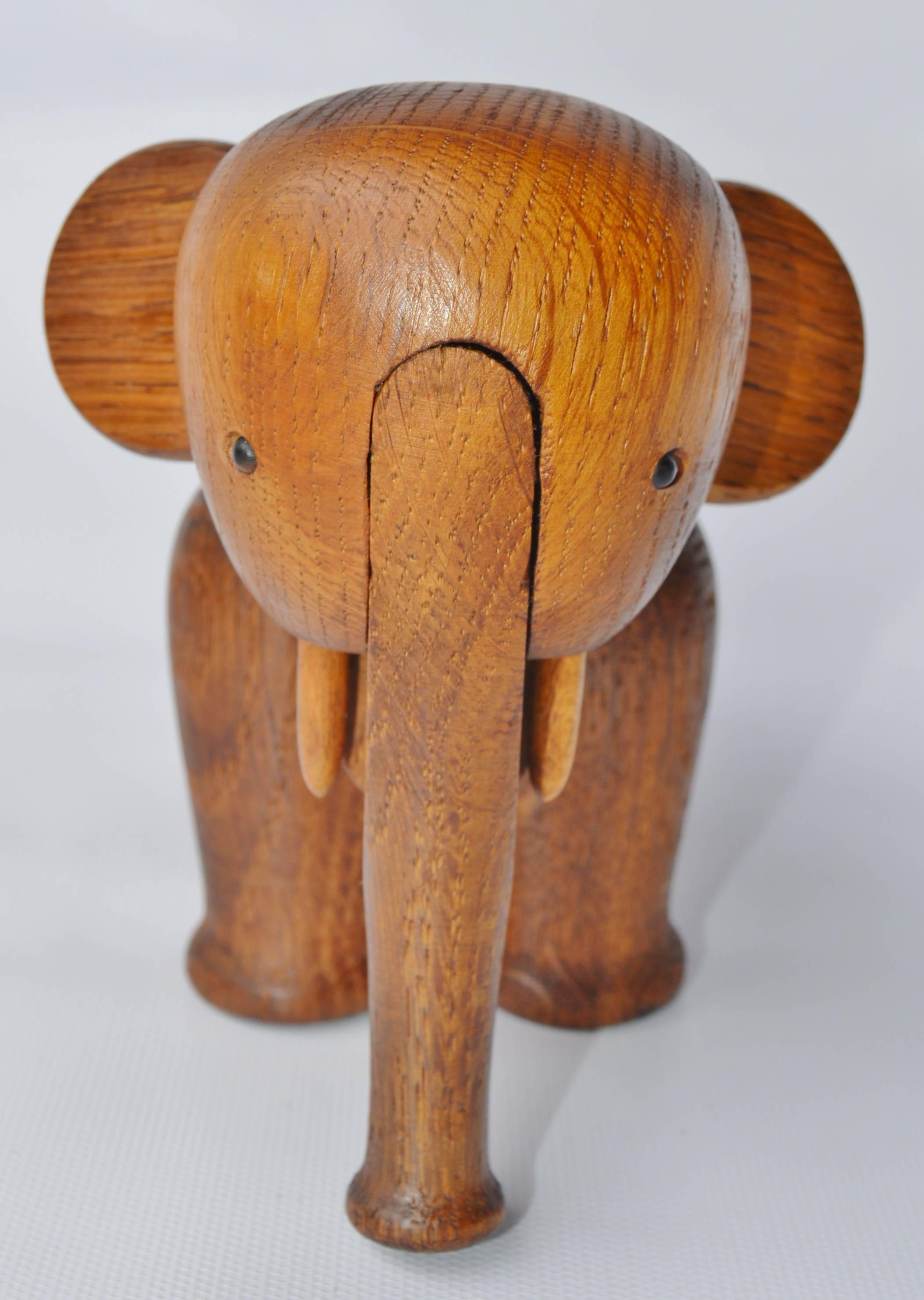 This delightful Danish modern 1950s solid oak elephant figure was designed by Kay Bojesen in the 1950s and features a moveable trunk, head and legs. The styling and sweet character of the figure is sure to please, freshly oiled and in excellent