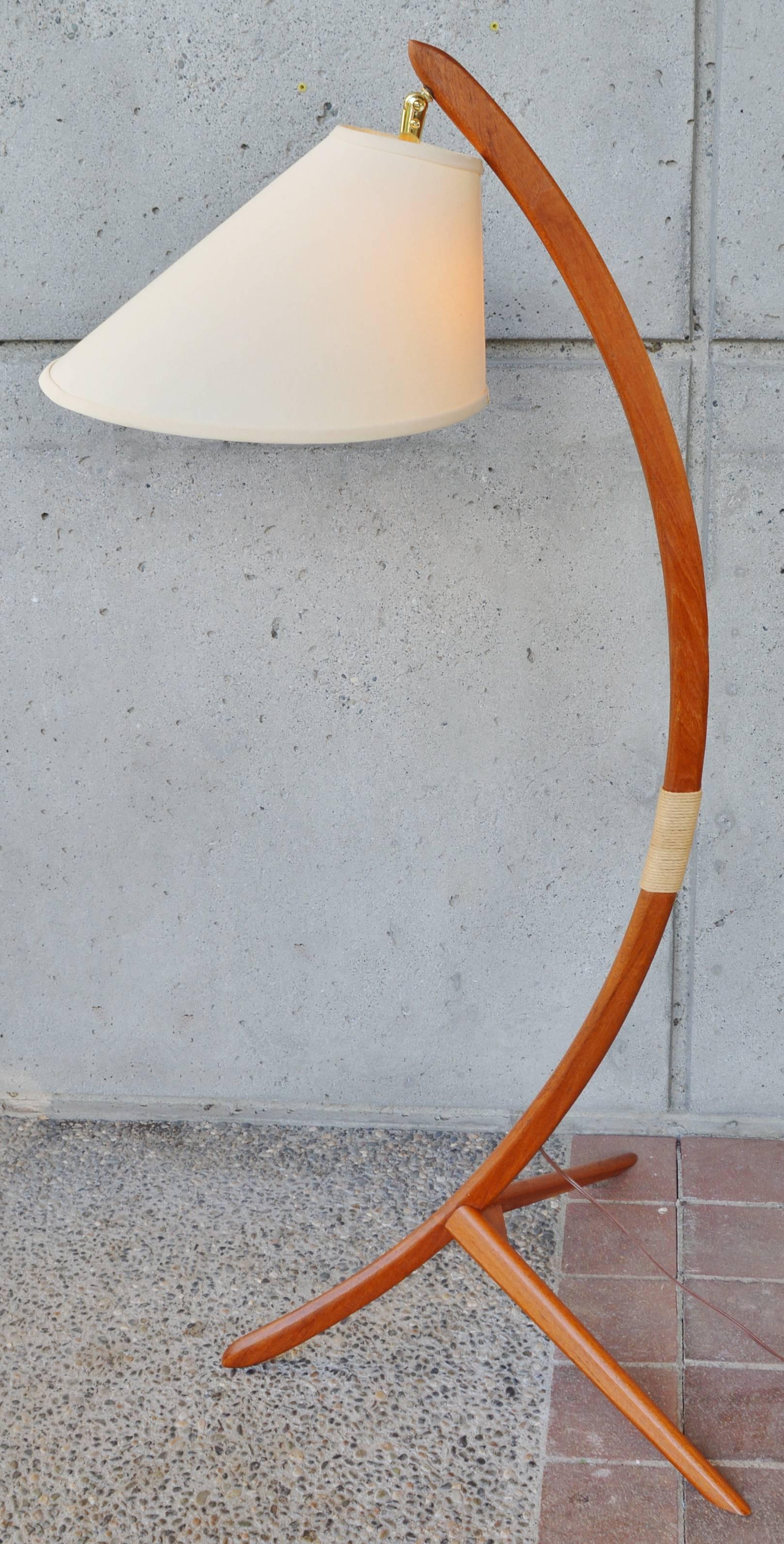 This iconic Danish Modern teak floor lamp in the style of Rispal is so dramatic and a real scene stealer! In awesome condition and freshly oiled, the lamp is nick named the 