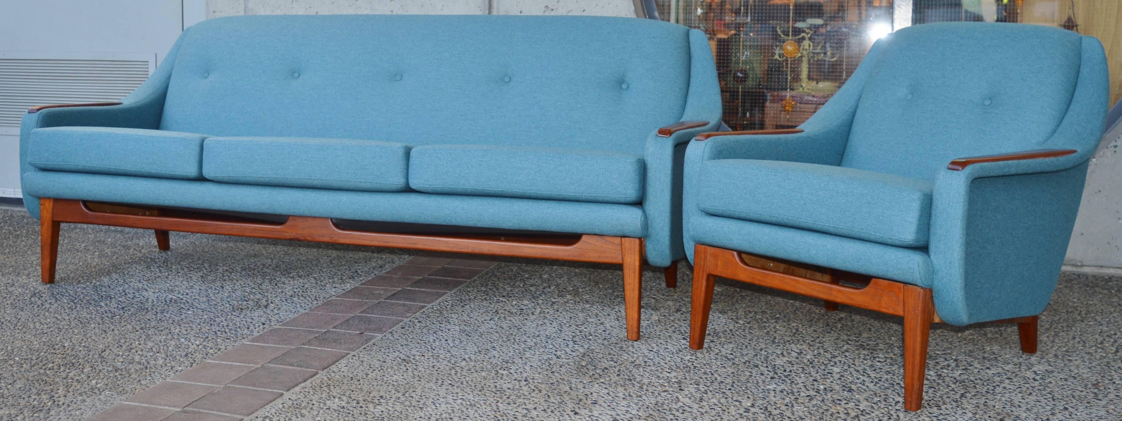 This lovely Danish modern / Scandinavian teak couch and lounge chair are spectacular! The wood work has been refinished and it has been completely restored, stripped to the frame, with new springs, Pirelli rubber strapping, quality foam and a