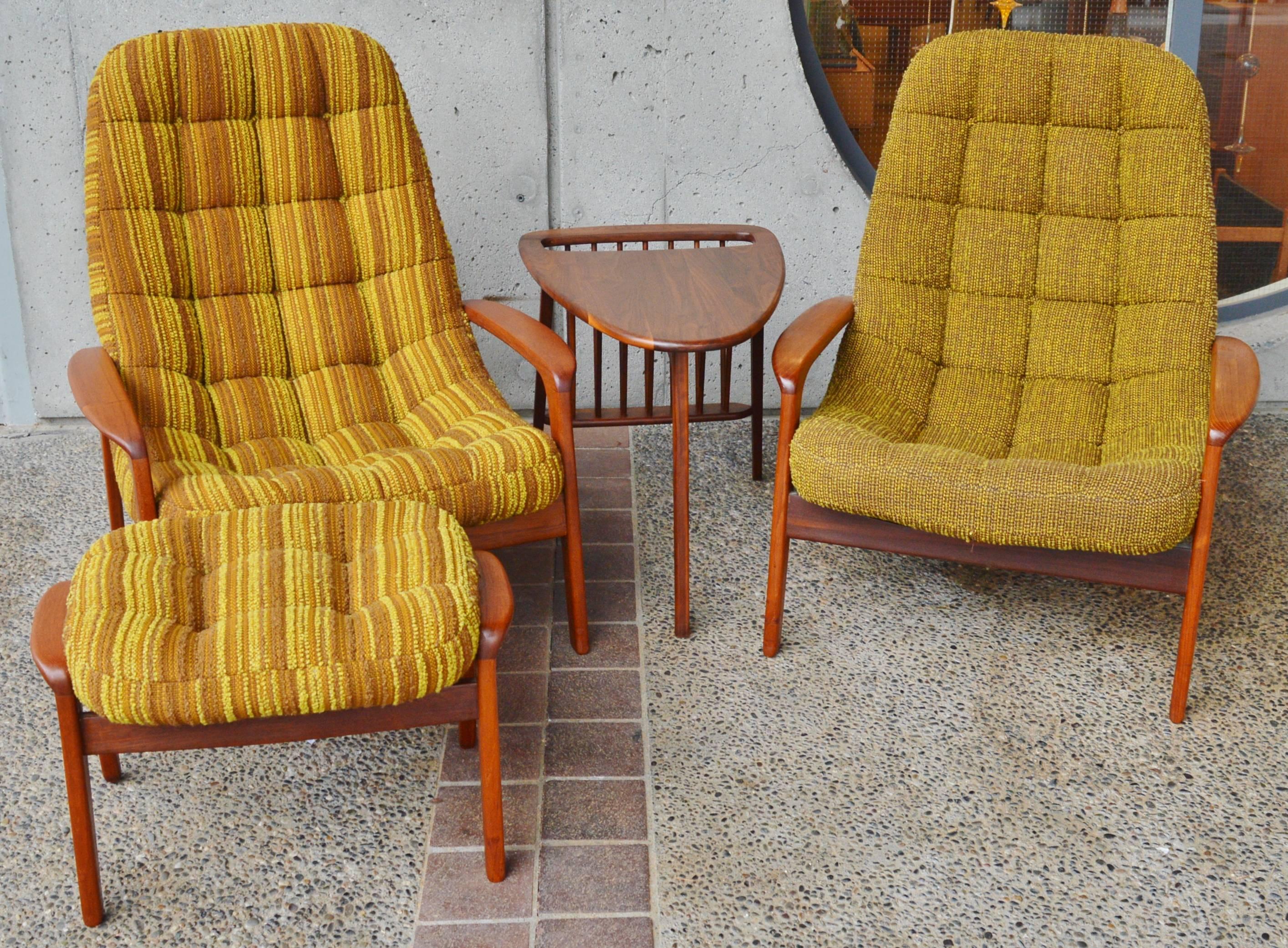 This amazingly fun pair of Danish modern style teak frame lounge chairs, nicknamed the 