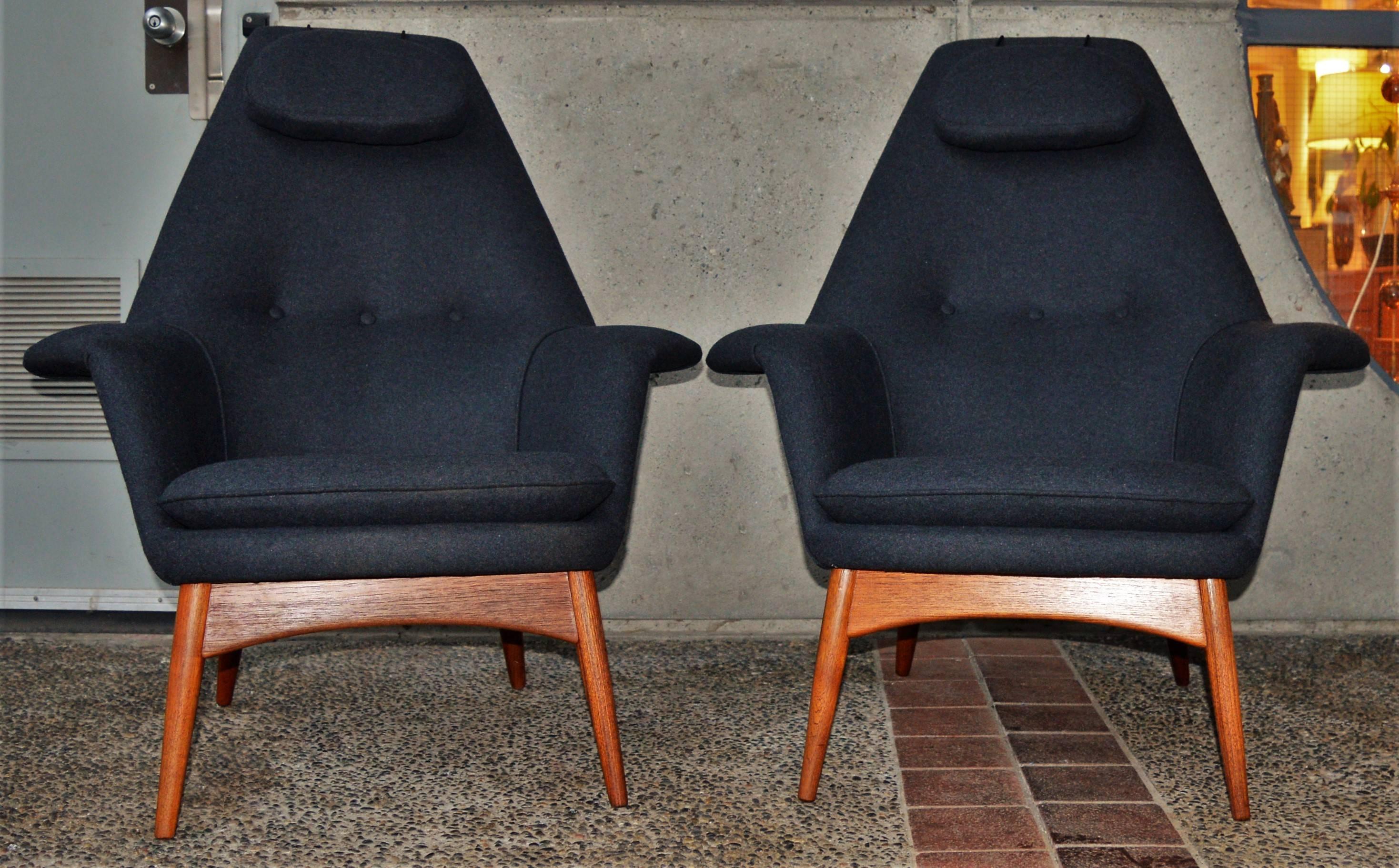 This is a totally killer pair of restored Danish modern teak lounge chairs - called the Manta Ray Chair - by Bjorn Engo for DUX (Sweden) designed in the 1960s. The gorgeous sculptural teak frame is beautifully extends to round ends that support the