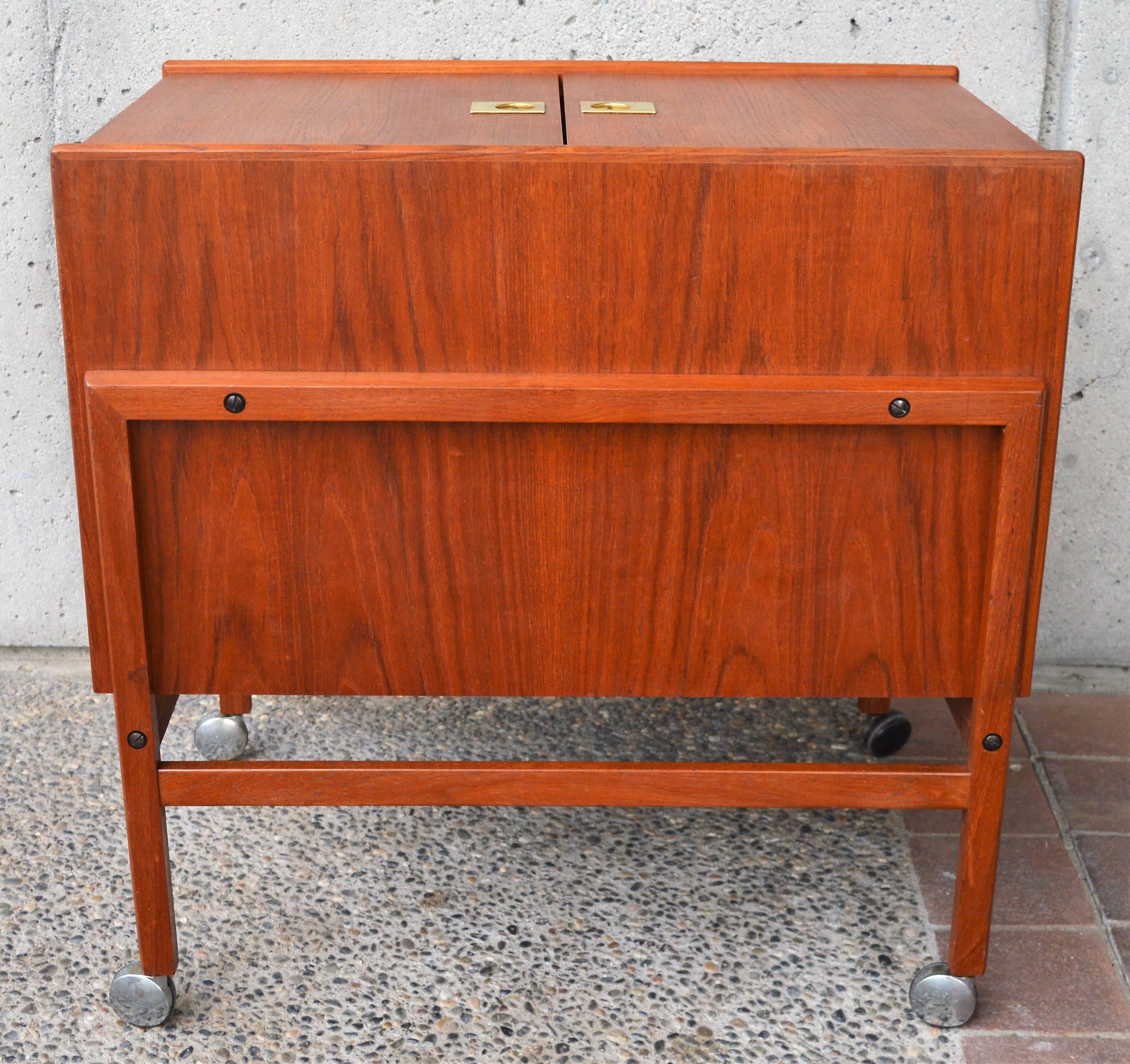 Mid-20th Century Danish Teak and Brass Bar Cabinet on Casters with Bottle and Glass Storage