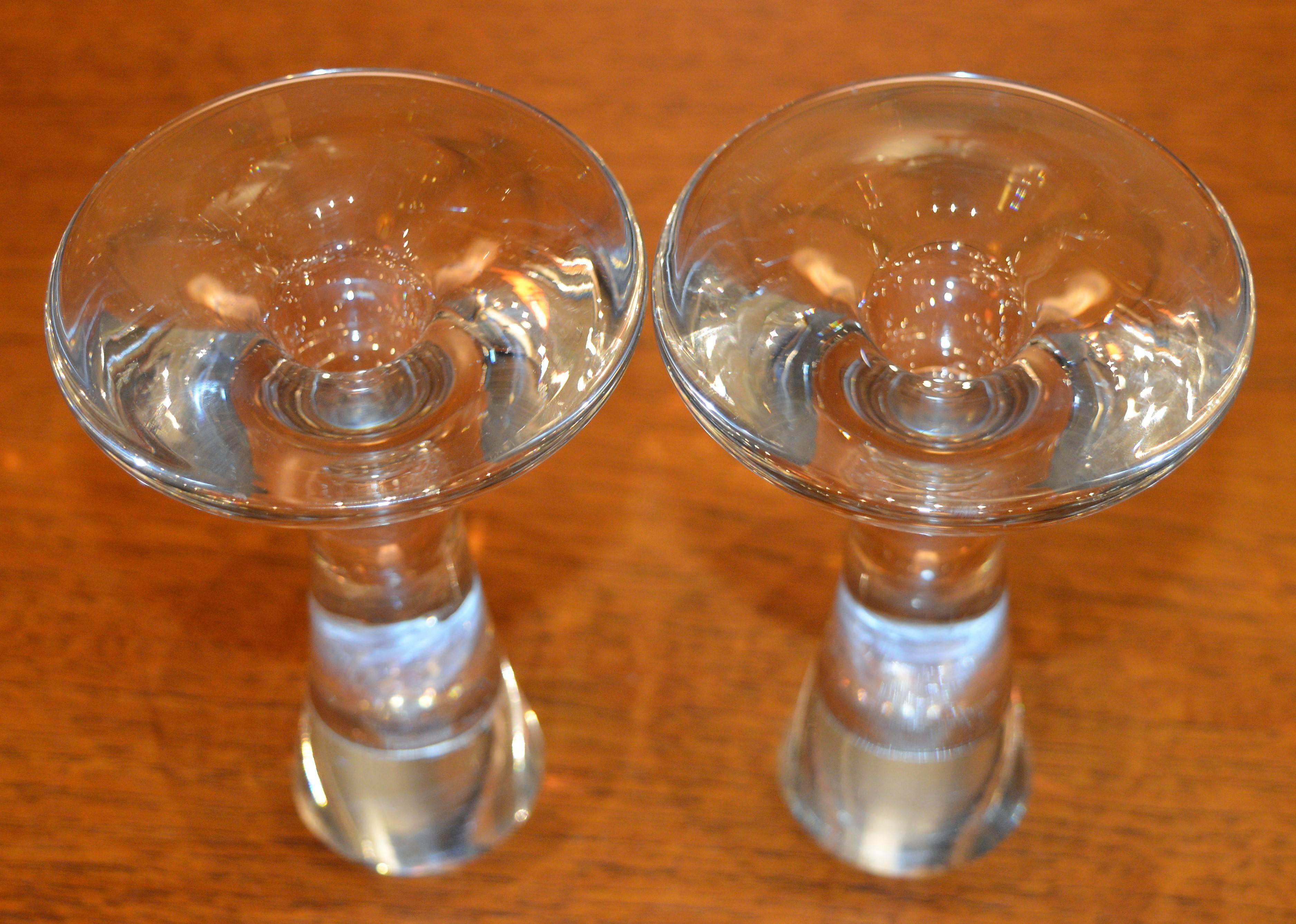 This delightful pair of signed Tapio Wirkkala elegant hourglass candlesticks are amazingly beautiful. handblown in the 1950s for Iittala. In fantastic condition - note one small chip on the base of one of them (see photo), which being on the base,