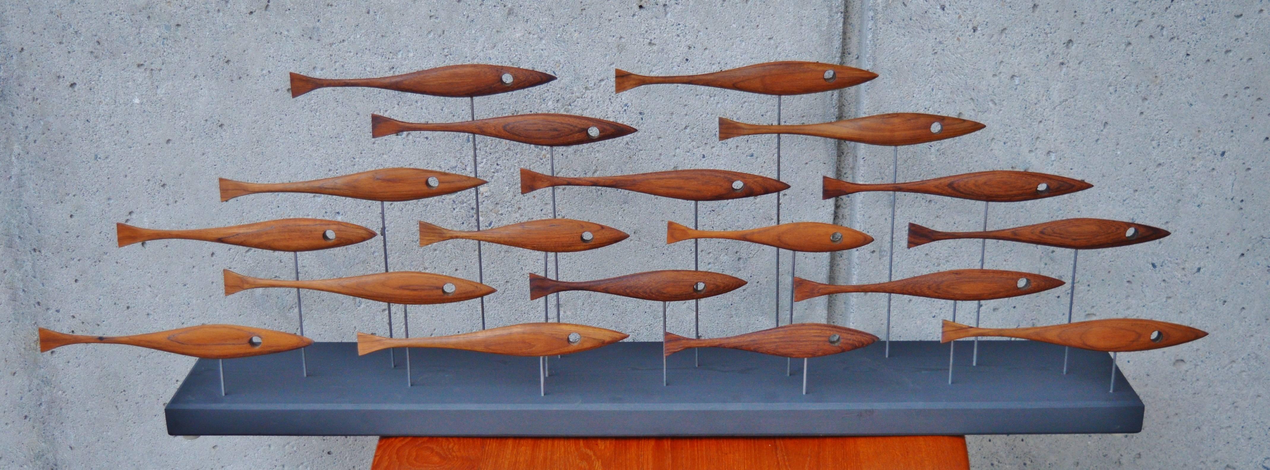 Vancouver BC artist, Tyler Fritz has always had a love of Danish Modern and walnut Mid-Century furniture. Coming across pieces that have been destroyed beyond being restored, he decided to salvage and carve the hardwood remnants into delightful