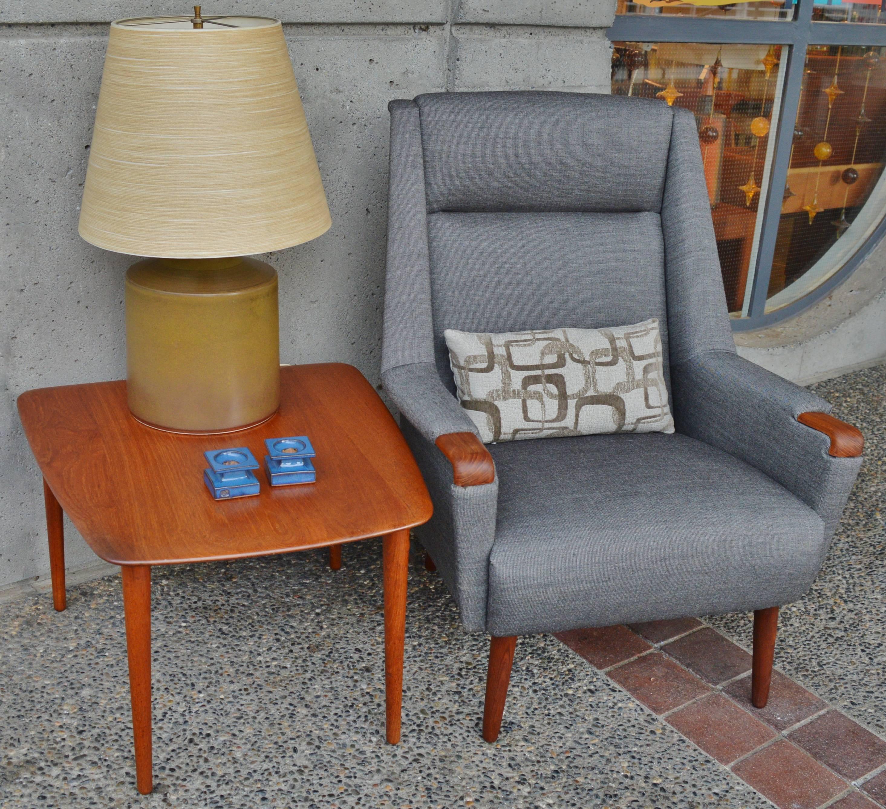 This lovely Danish Modern early solid teak side table was designed by Peter Hvidt & Orla Molgaard-Nielsen for France & Daverkosen in the 1950s. This table design is little seen (at the point of publishing this item, there are no others listed on 1st
