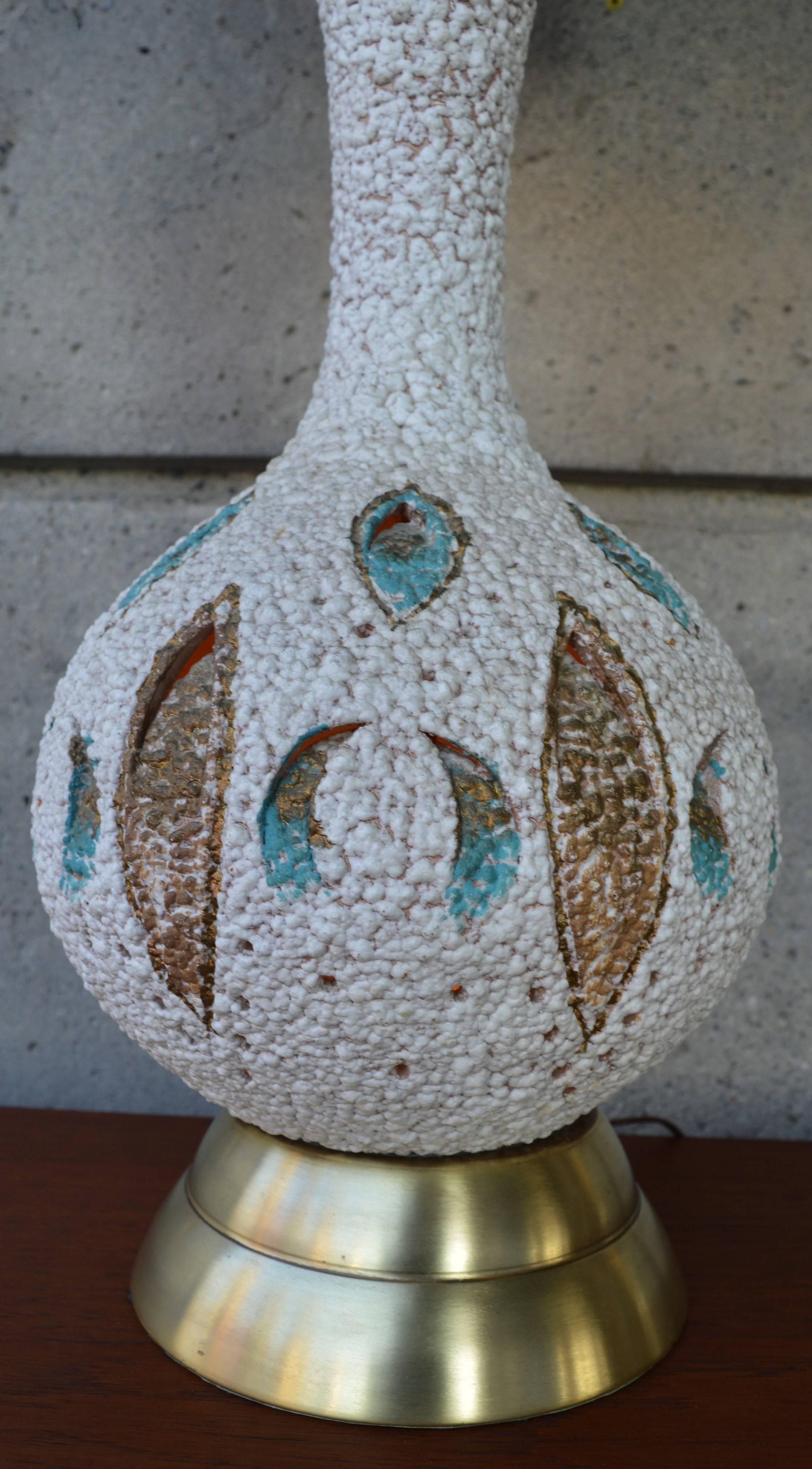 This gorgeous, Classic 1950s ceramic lamp has a wonderful textured white glaze and charming gold and turquoise leaf cut-aways in the base that is also lit. Light the top light, the top and the base, or the base alone for a night light that casts