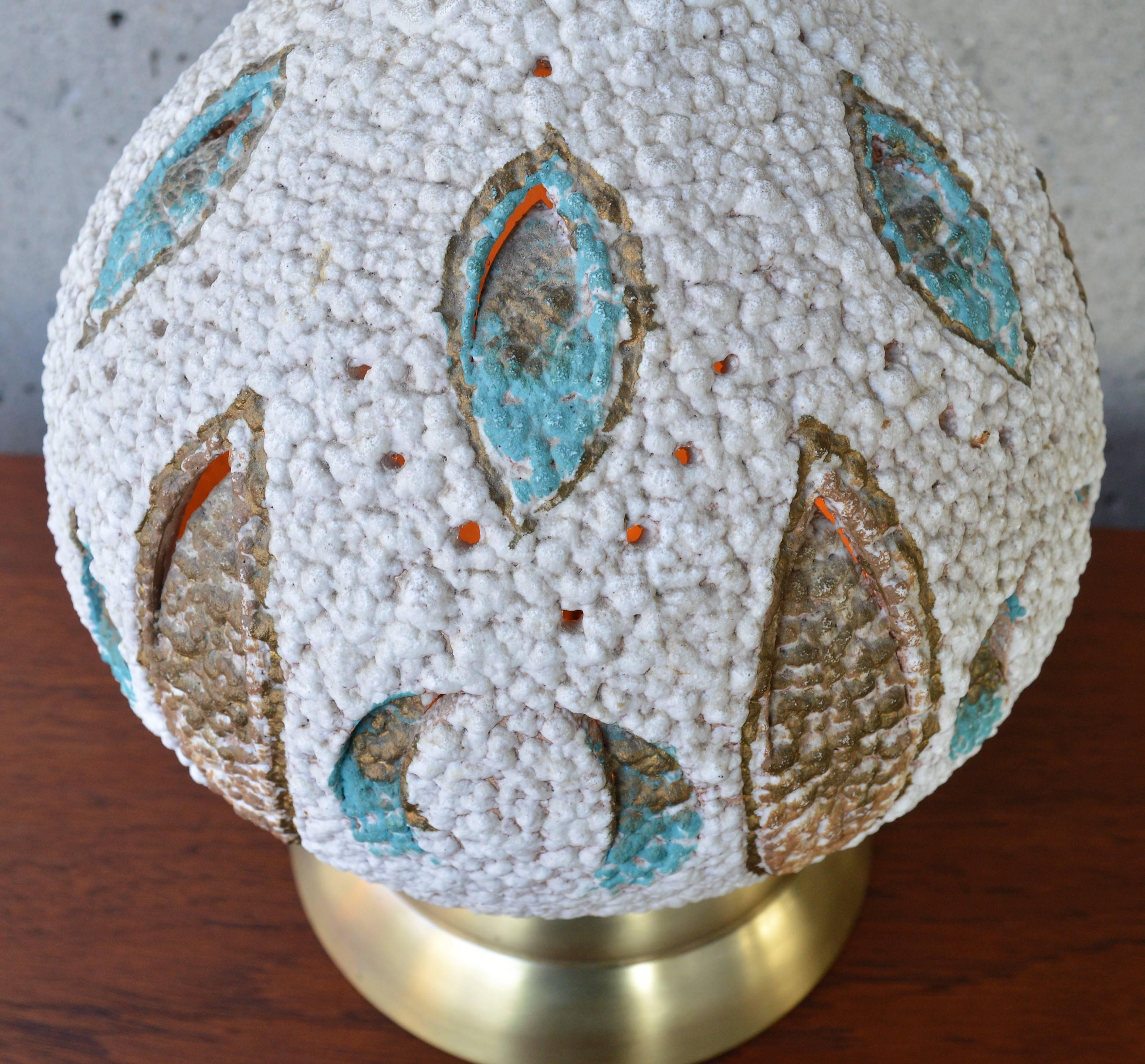 North American Mid-Century Modern Textured Ceramic Lamp with Leaf Cut-Outs and Lit Base For Sale