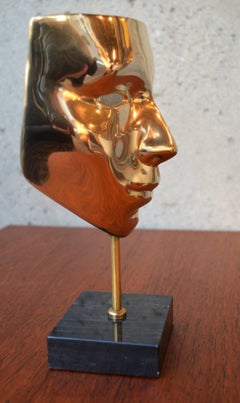 Brass Carnival Mask Mounted on Black Marble