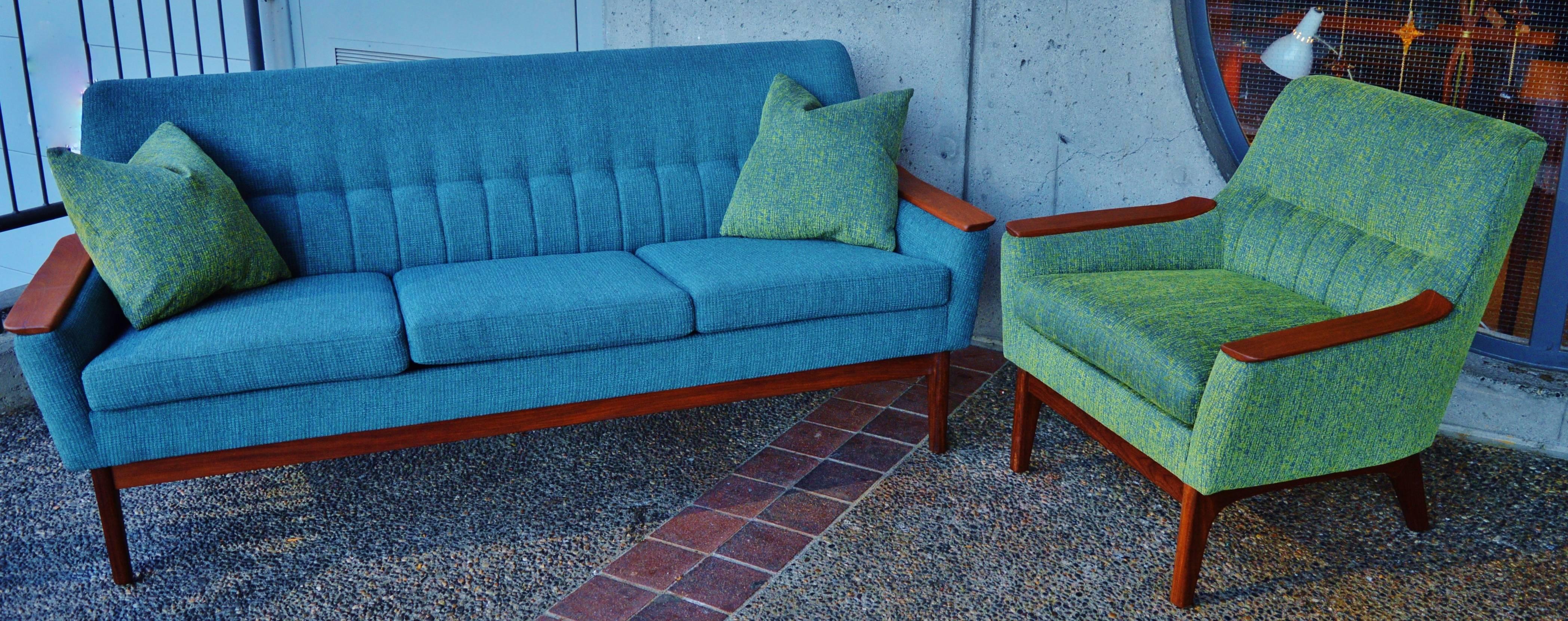 This spectacular Danish Modern teak fully upholstered sofa and lounge chair have been completely stripped to the bare bones and rebuilt with new Pirelli strapping, top quality 25 year foam and complementary fabrics--the sofa in a rich teal tweed and
