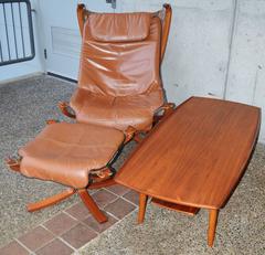 Tall Back Falcon Chair and Ottoman by Sigurd Ressell