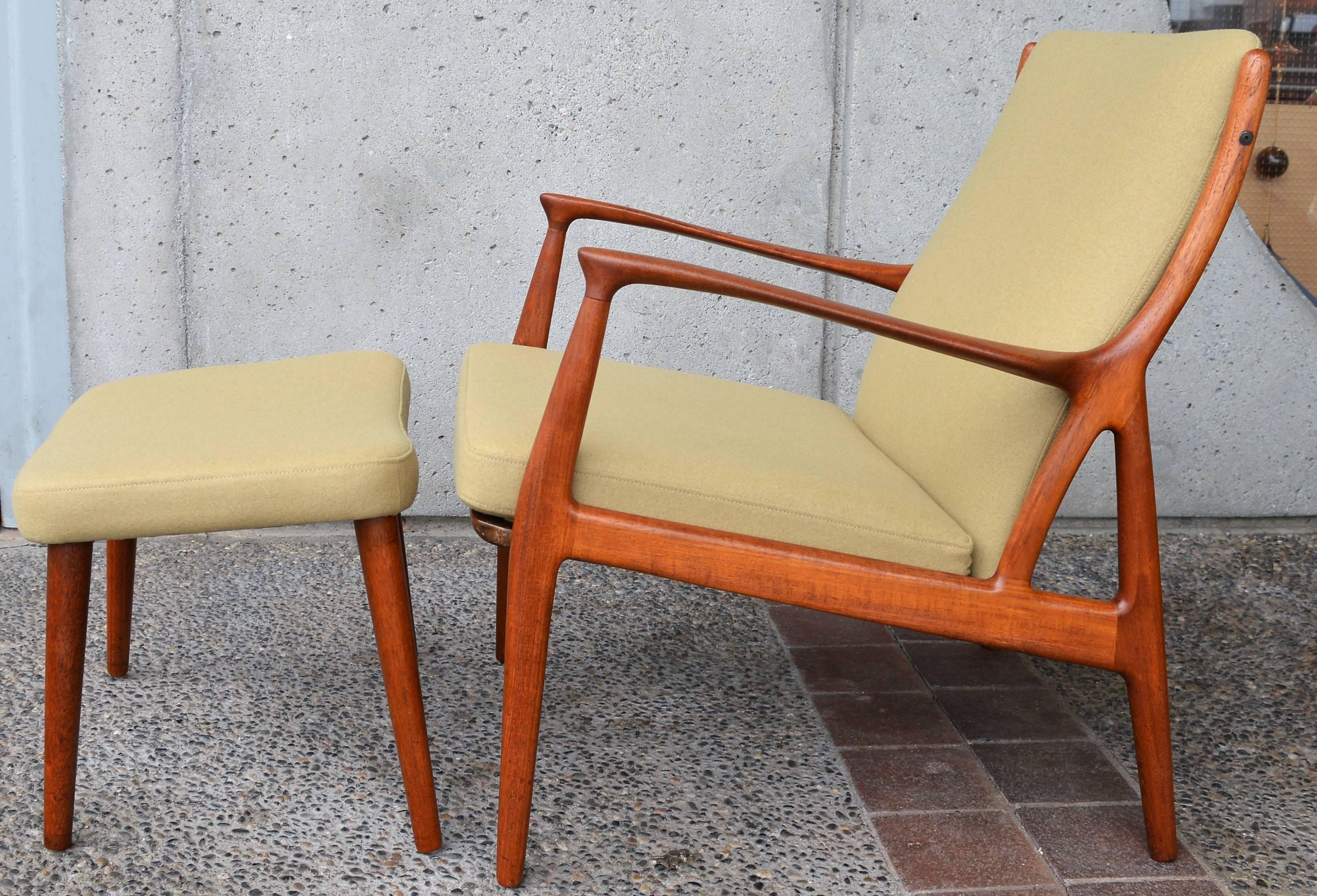 This amazing sculptural beauty has been completely restored and reupholstered with latex foam and to the correct original styling with the loose seat cushion floating atop the sprung wood framed seat deck. Designed in the 1960s in Denmark by Erik