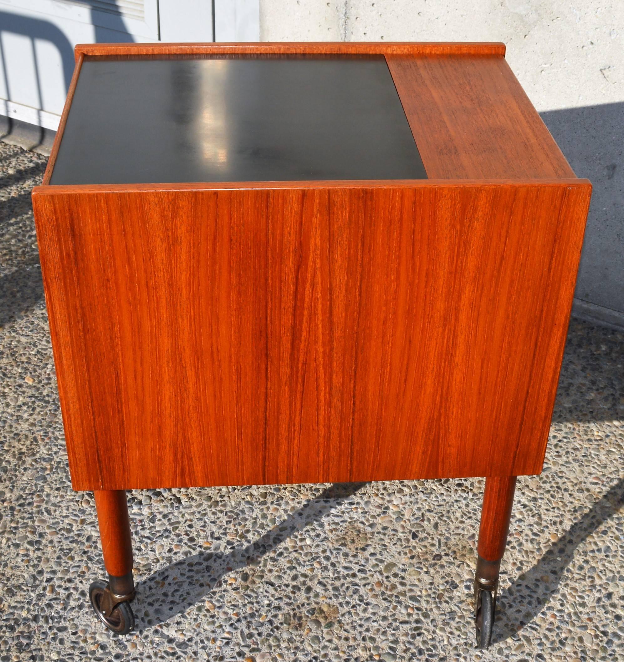 Unique Scandinavian Teak Side Table or cart with Casters 4