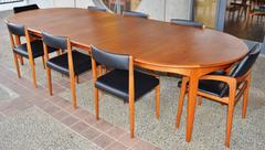 Danish Teak Round Four-Leaf Dining Table by Henning Kjaernulf / Soro Stolefabrik