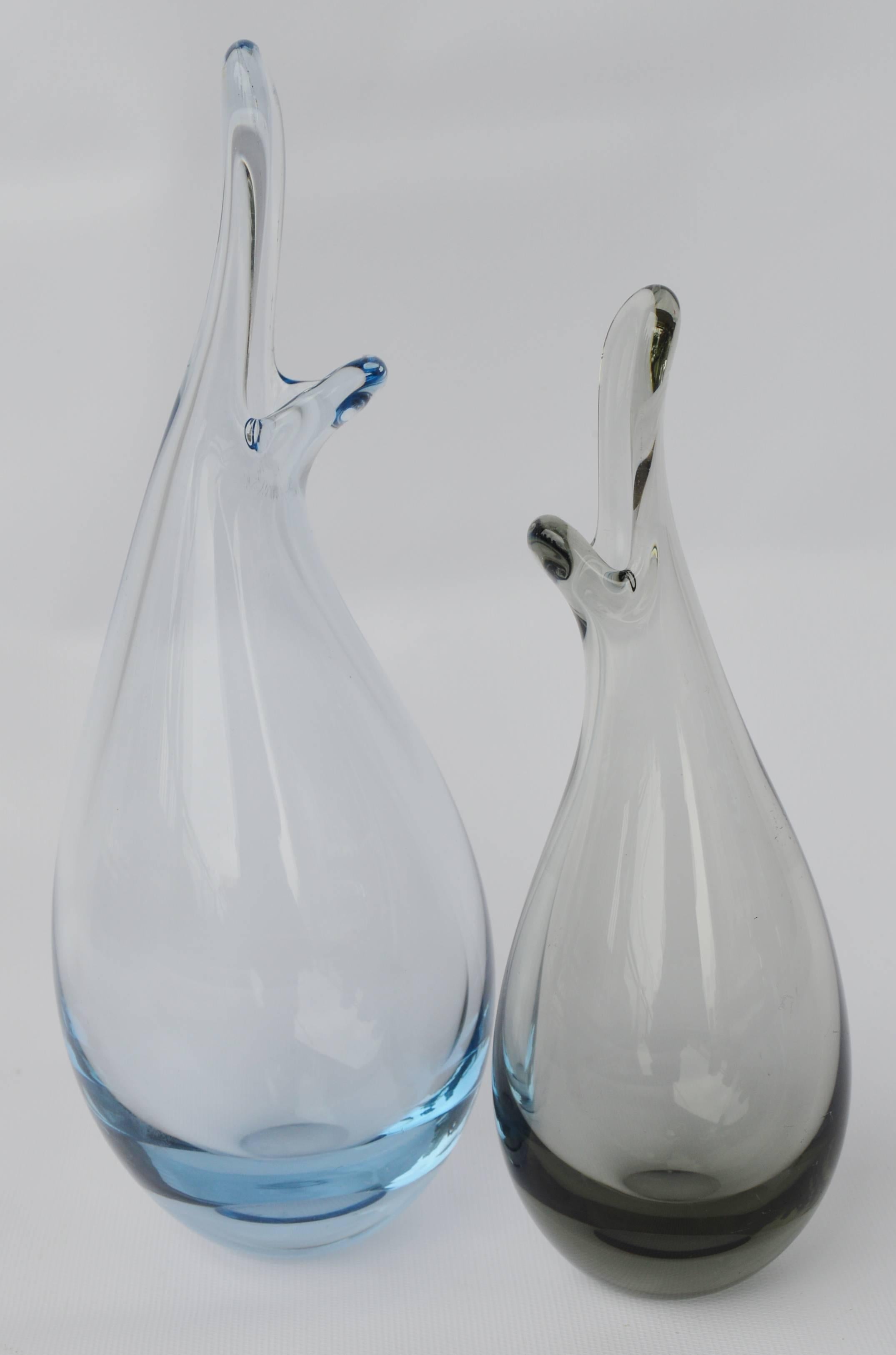 This delightful pair of handblown art glass duckling vases have so much character! Made by Per Lutkin for Holmegaard (signed), the larger is in a pale blue, the smaller one is smoked. In fabulous condition generally - with no chips or flea bites,