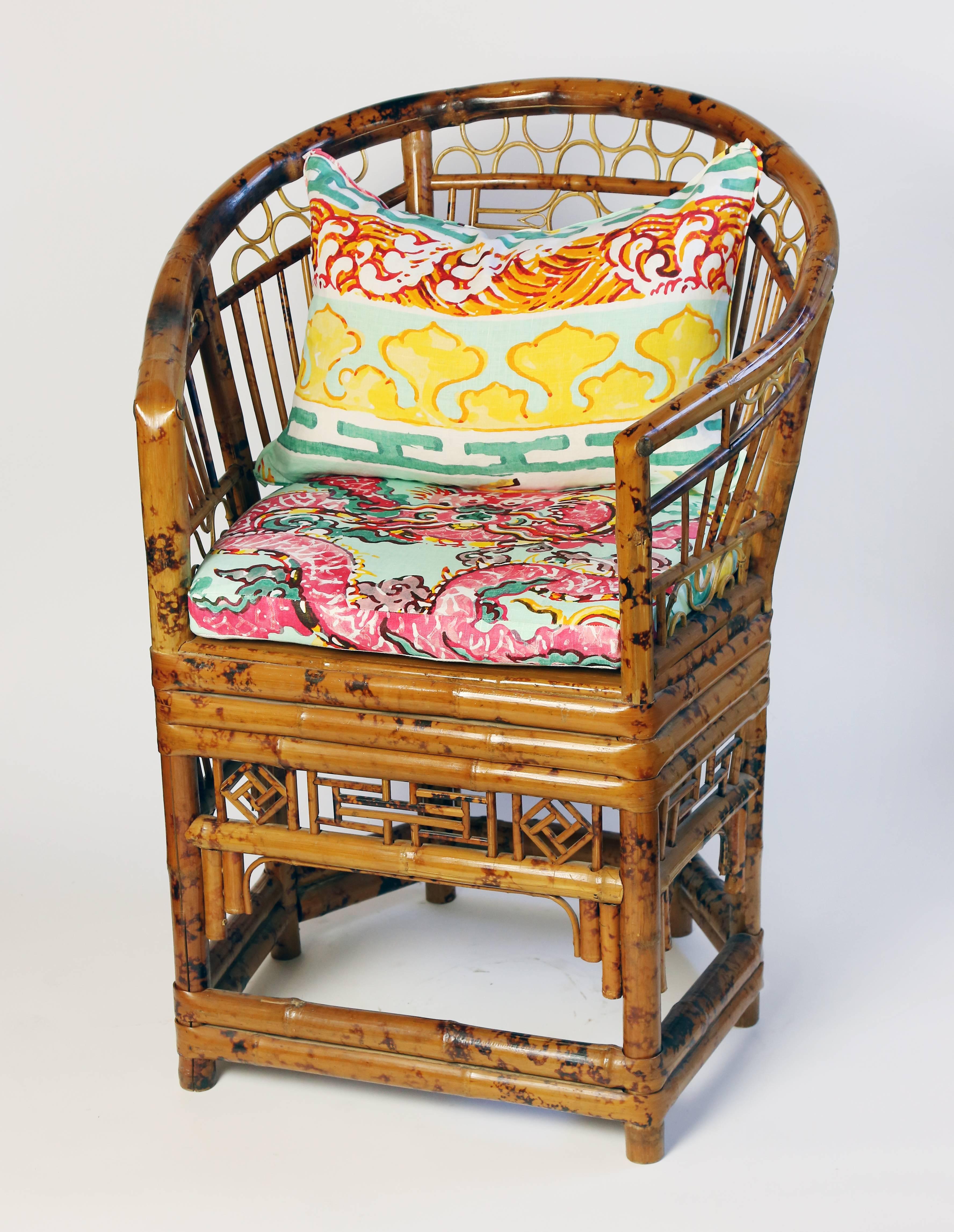 Brighton Pavilion style armchairs, bamboo frame with Chinese inspired patterns, rising on six legs joined by stretchers, with new Jim Thompson 