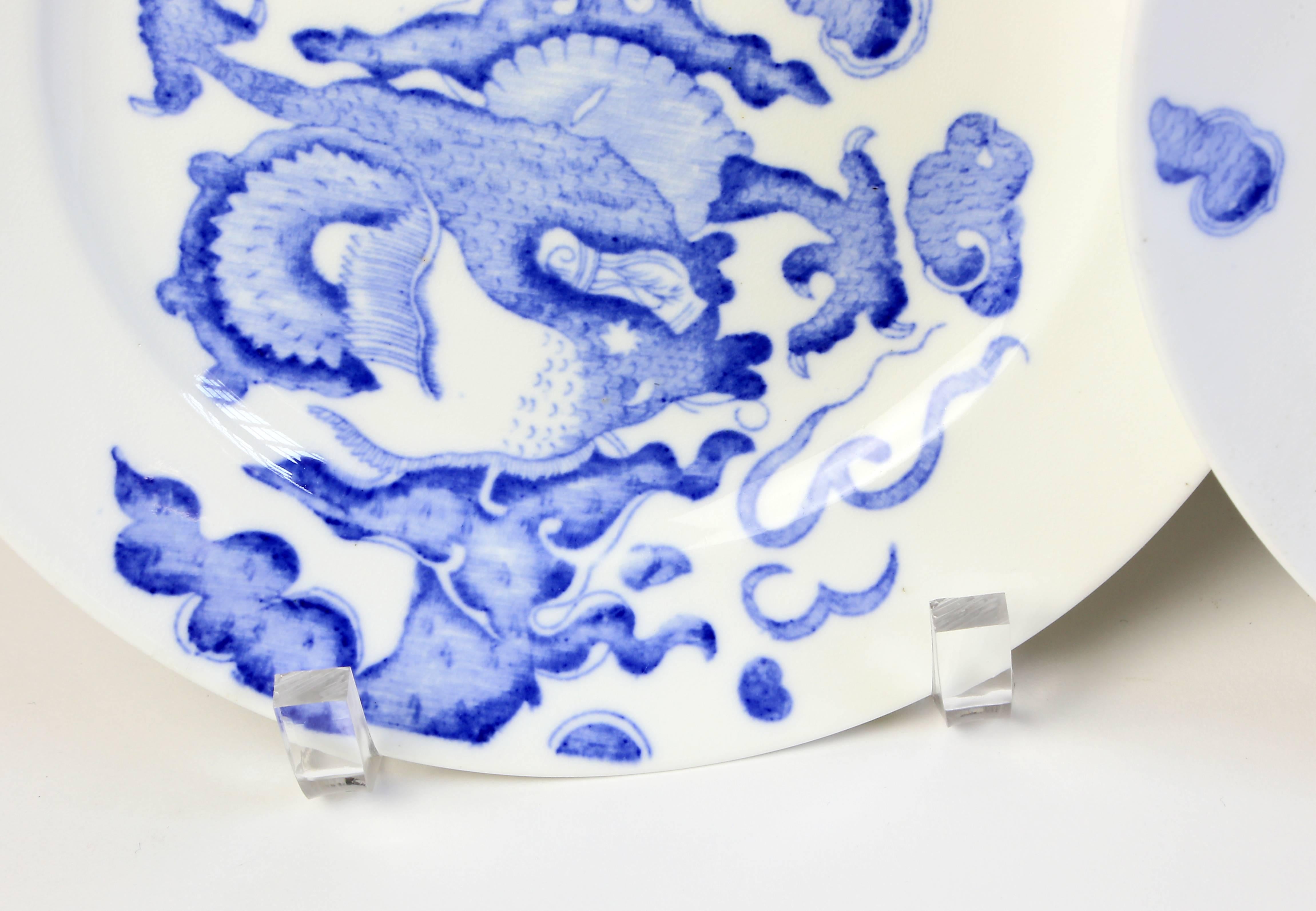 A set of four plates in the blue and white dragon pattern by Coalport.