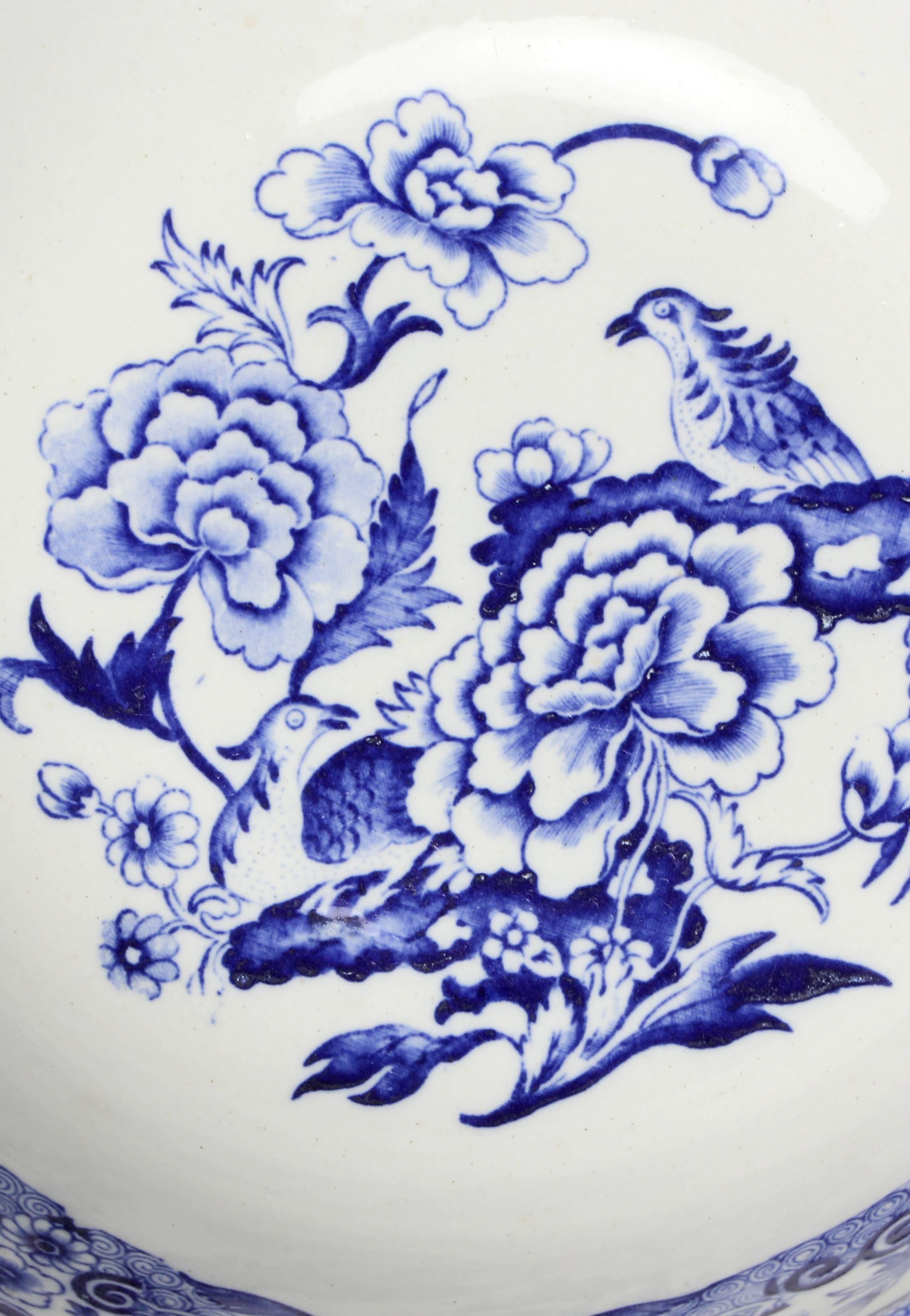 An ironstone bowl by Mason's in the blue pheasant pattern. Measures: Bowl is 9