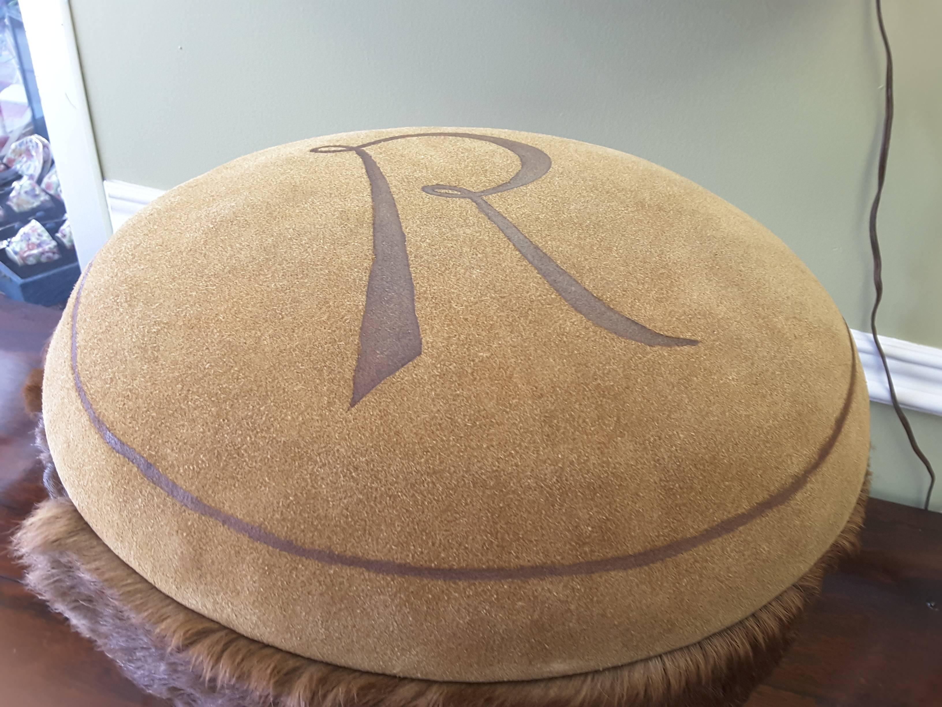 Mid-Century "Ranchboy" Stool, Fur & Suede by G.F. Holloway, Barrie, Ont. Canada. The stool is made with tan suede on top and a faux fur skirt, the three legged base is made of walnut and are a splayed leg. The stool measures