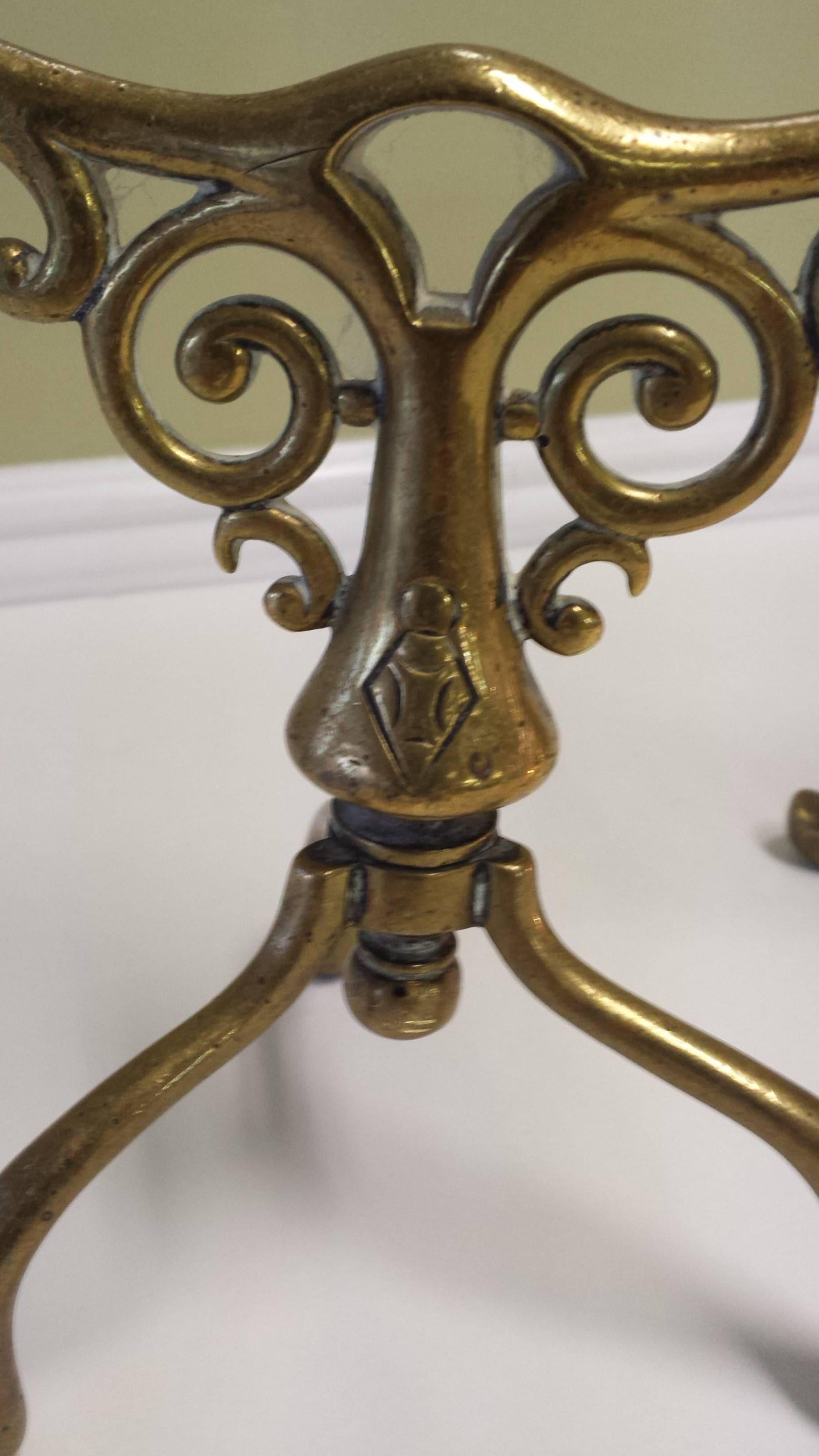 Victorian Fireplace Tool/Cooking Utensil Rests British Registration Marks, Made of Solid Brass, Very decorative, and could be used in another application. The British marks are polished out from years of use and are unreadable, The registration